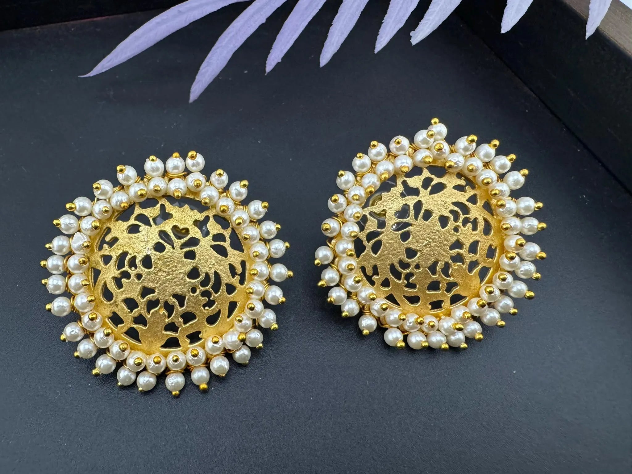 Premium Gold detailing and Pearls designer stud earring