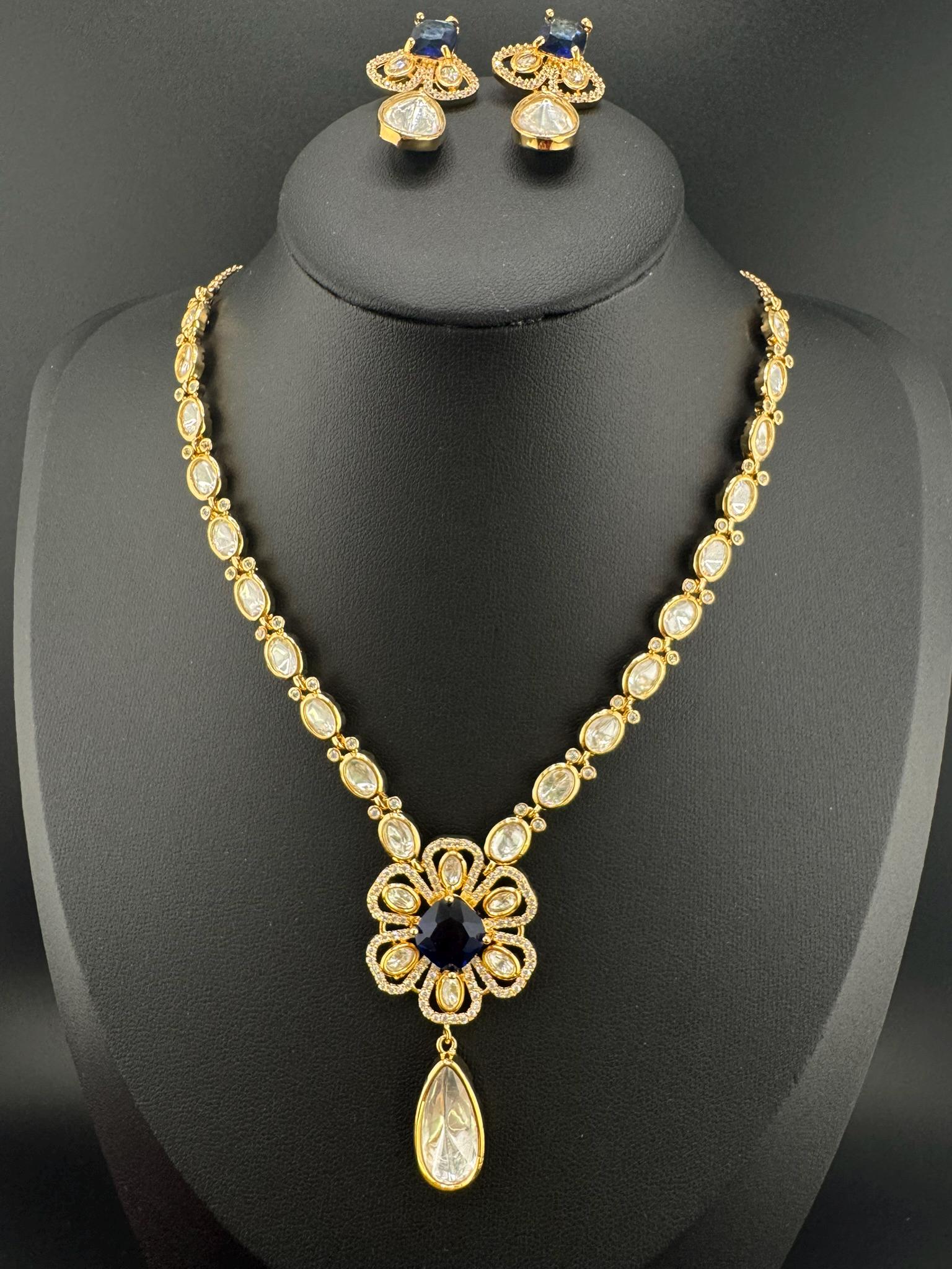 Premium Quality Moissanite Kundan, CZ,blue stone is Tyaani inspired Designer Necklace set with Kundan earrings