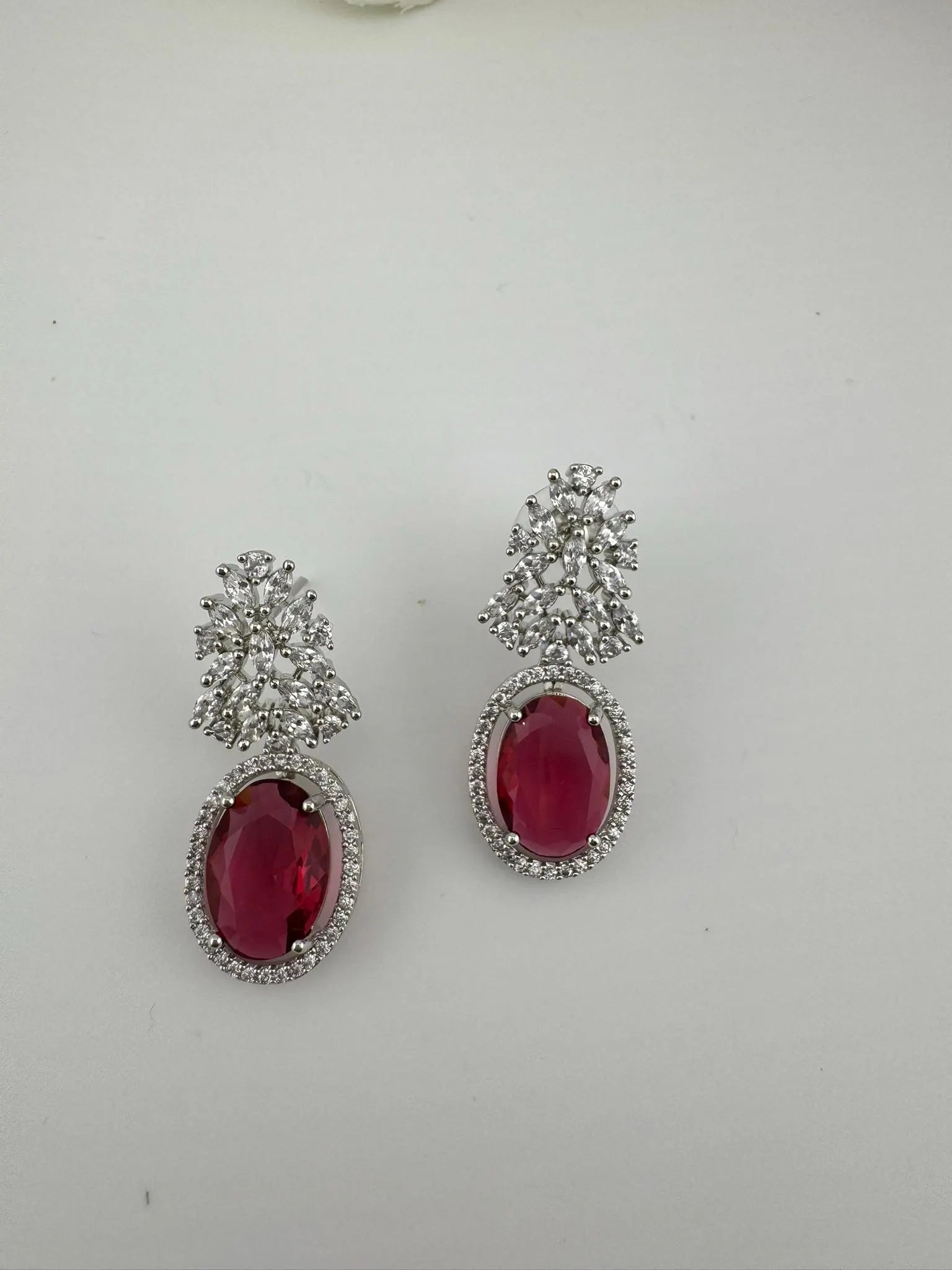 Premium Cubic Zirconia and Crystal stones in silver color earrings