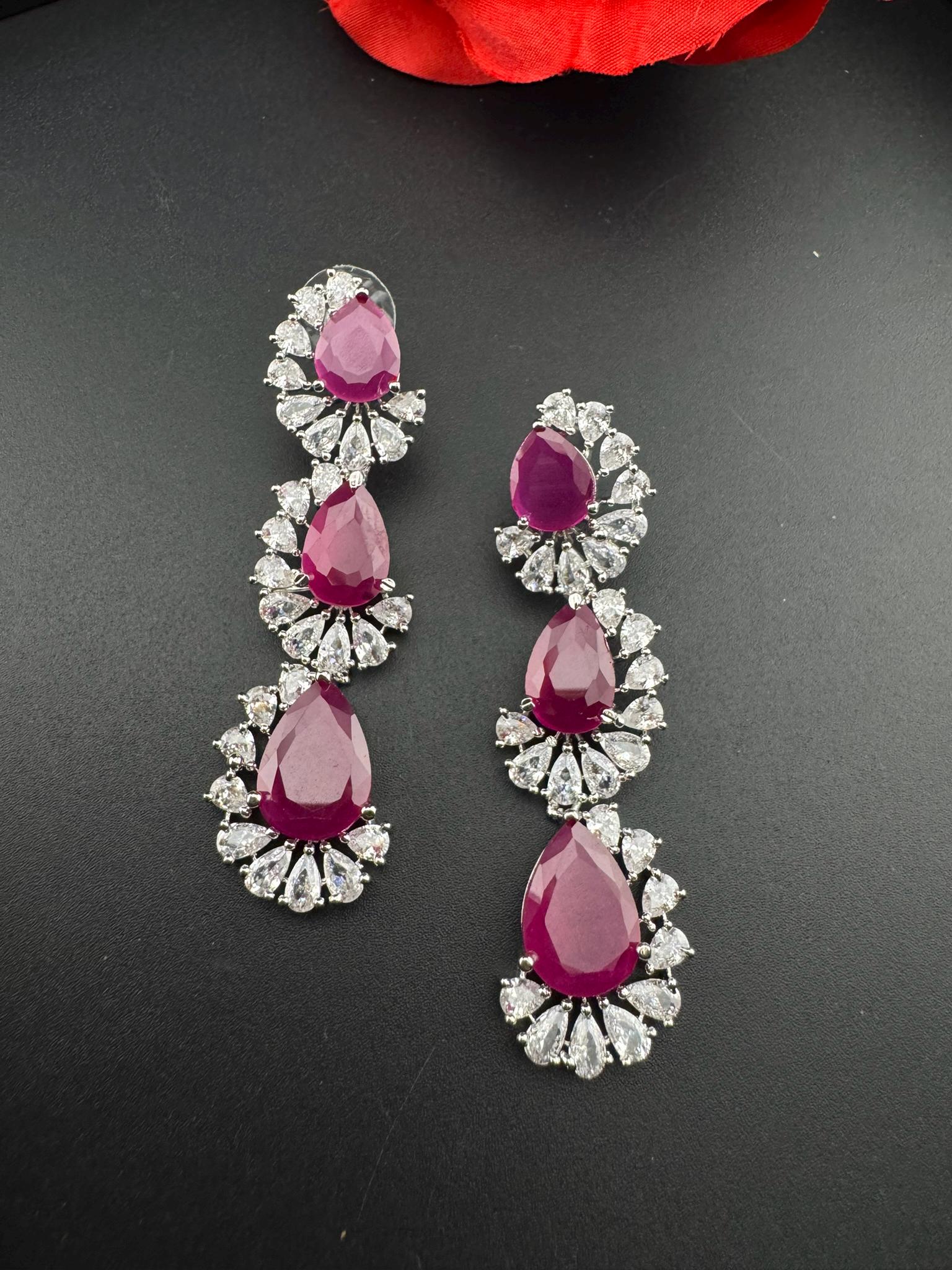 Premium Cubic Zirconia and Crystal stone in silver color Statement Long earrings