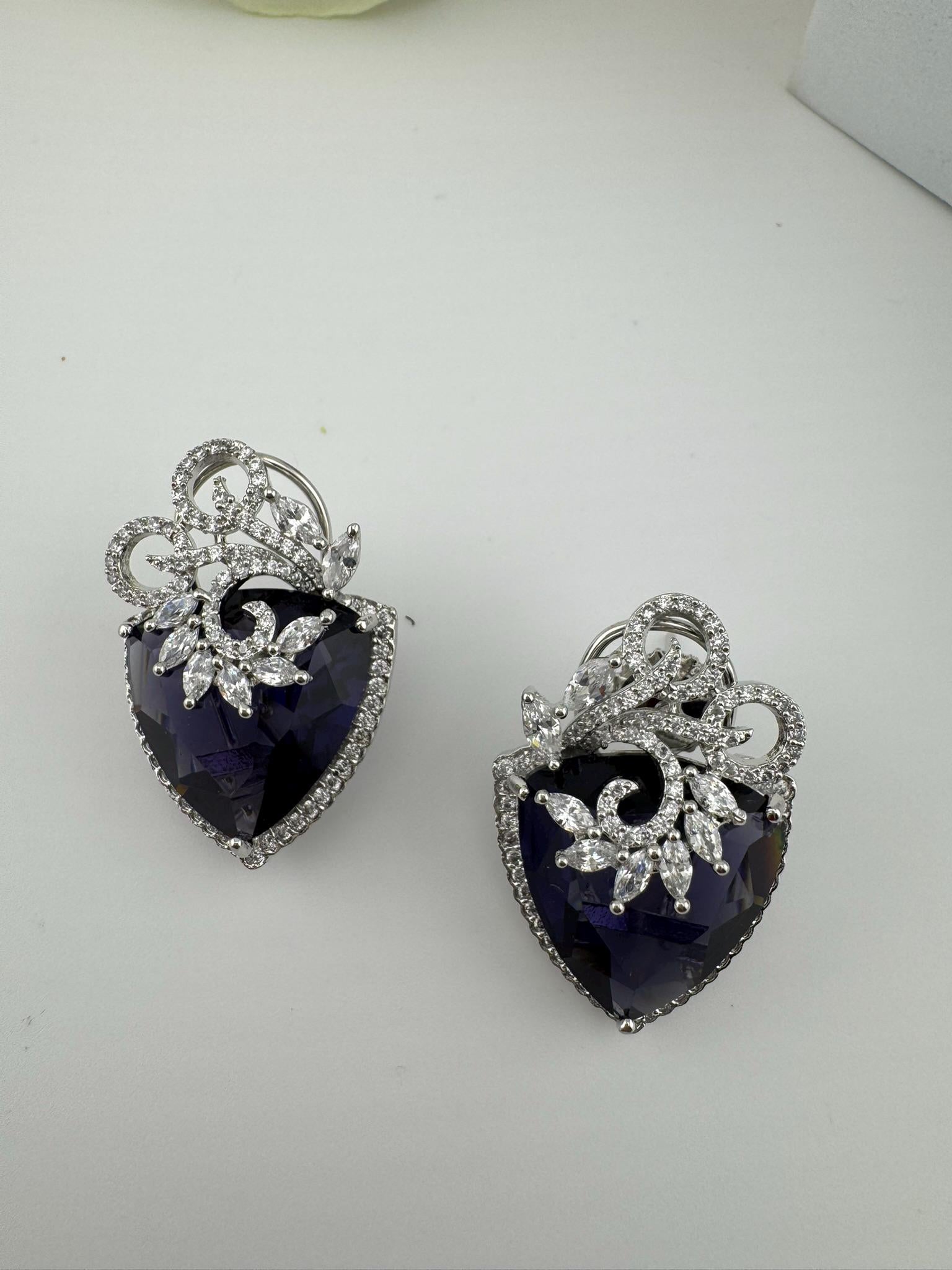 Premium Cubic Zirconia and Crystal stone in silver Polish Statement Studs earrings