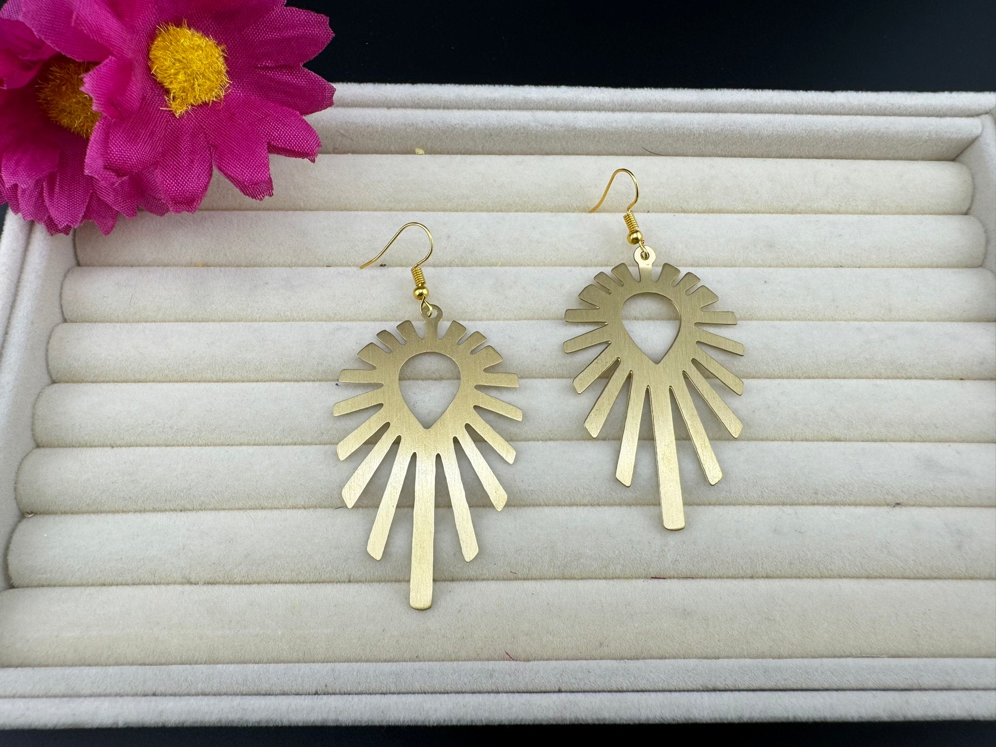 Matt Gold quirky earrings in unique sleek dazzle design