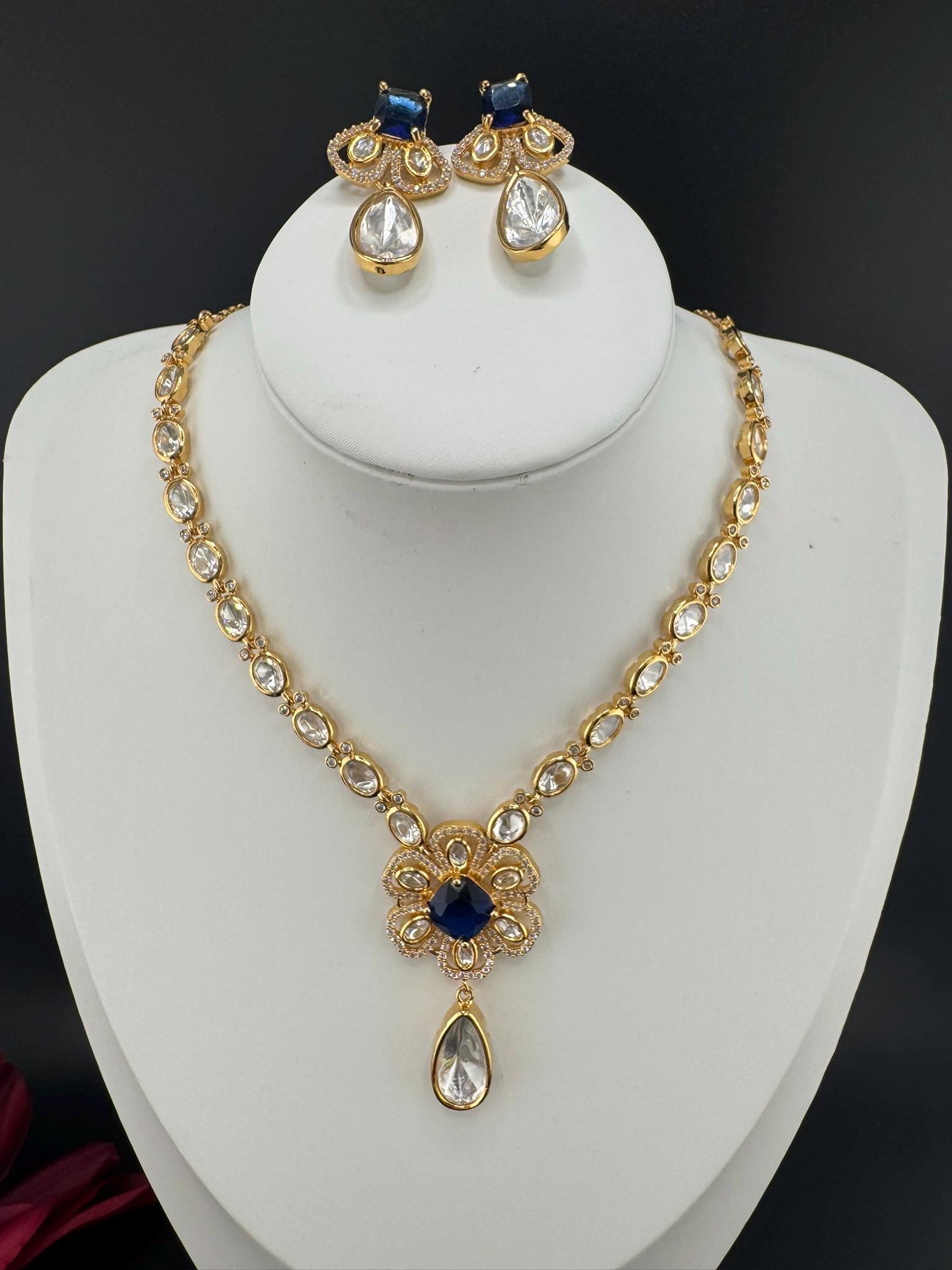 Premium Quality Moissanite Kundan, CZ,blue stone is Tyaani inspired Designer Necklace set with Kundan earrings