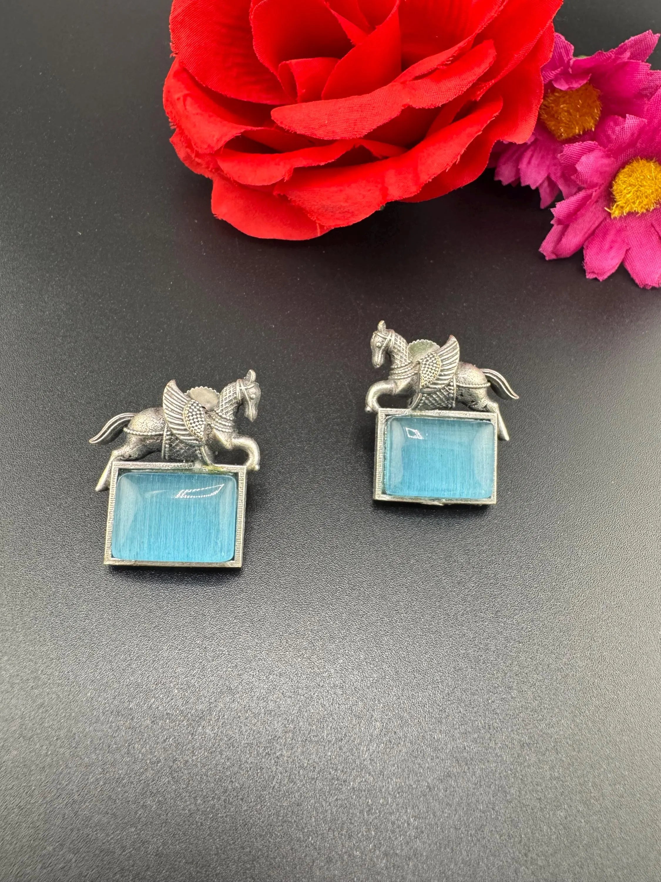 Oxidized German silver studs earrings with Horse details