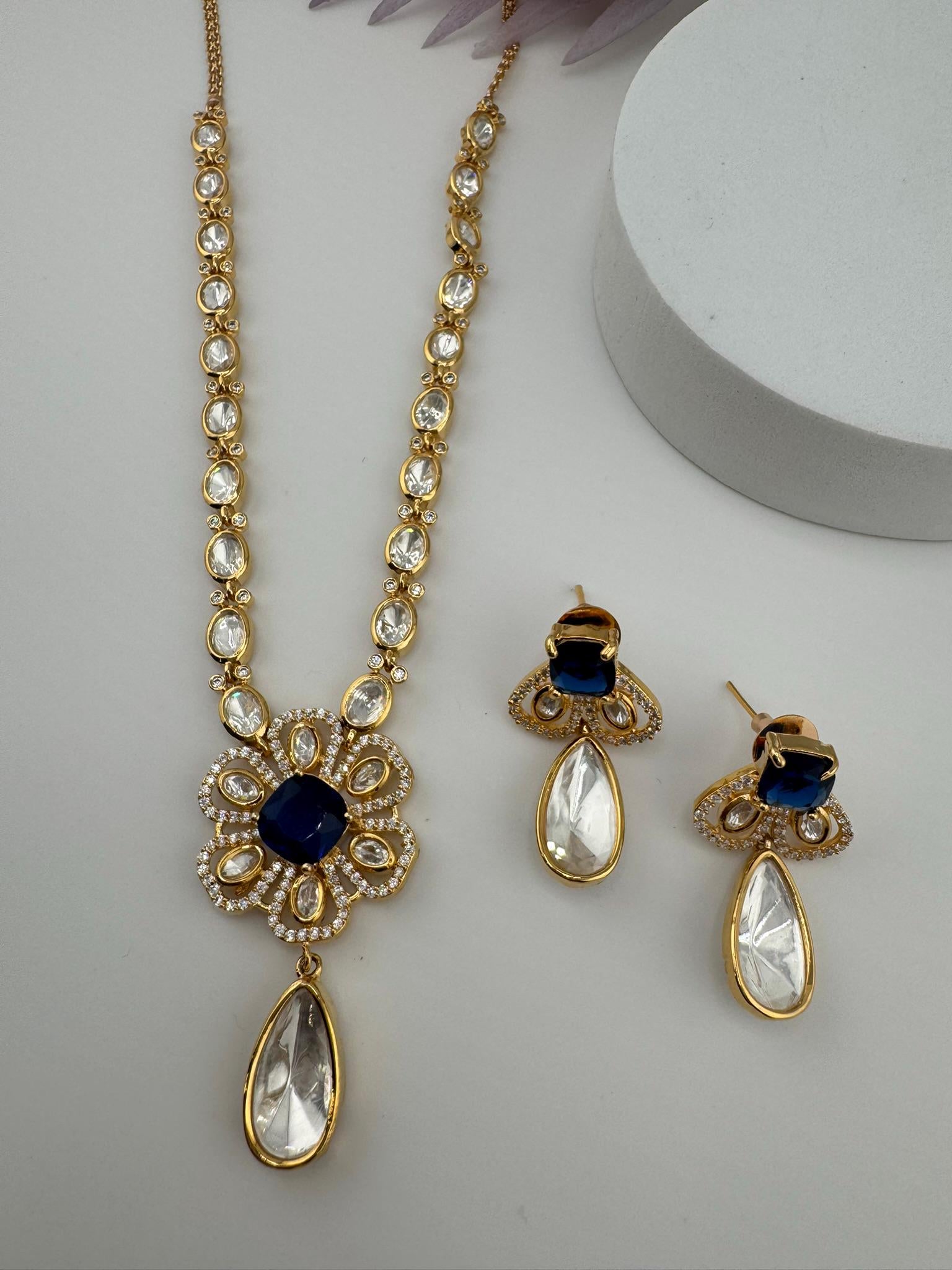 Premium Quality Moissanite Kundan, CZ,blue stone is Tyaani inspired Designer Necklace set with Kundan earrings