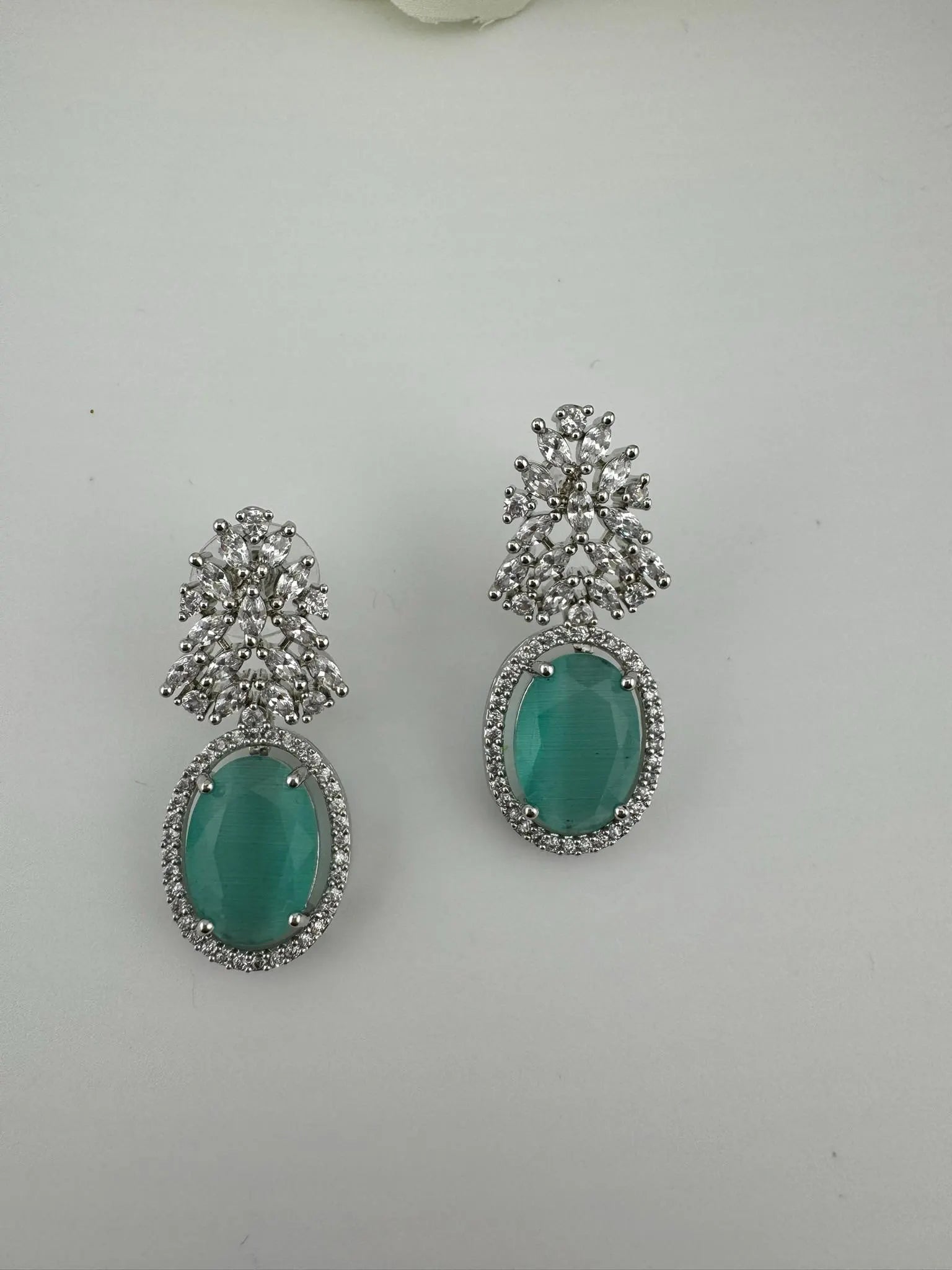 Premium Cubic Zirconia and Crystal stones in silver color earrings