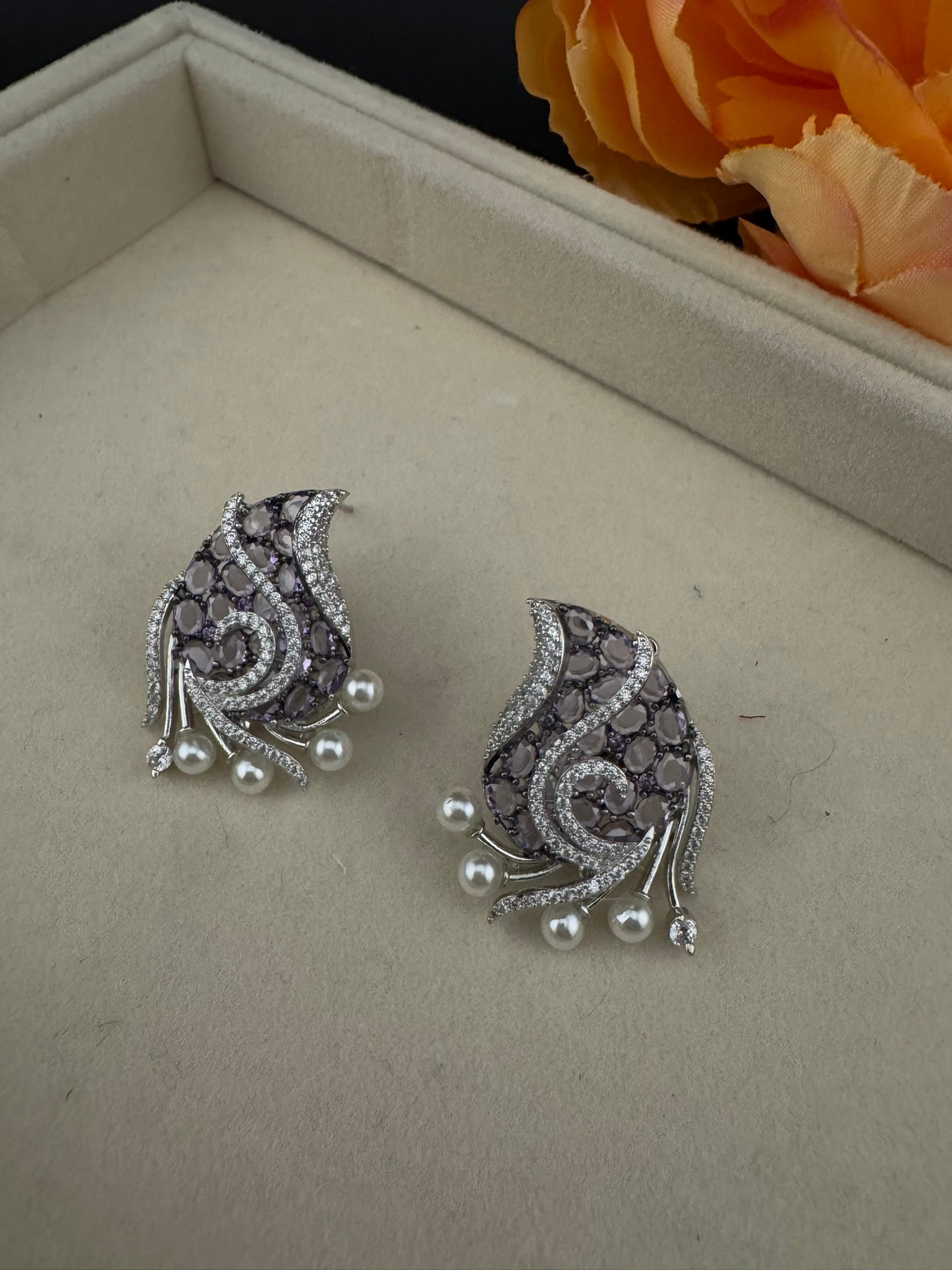 Premium Nano Setting Cubic Zirconia, Crystal stones in Unique setting is designer Inspired Statement Silver colored Stud earrings