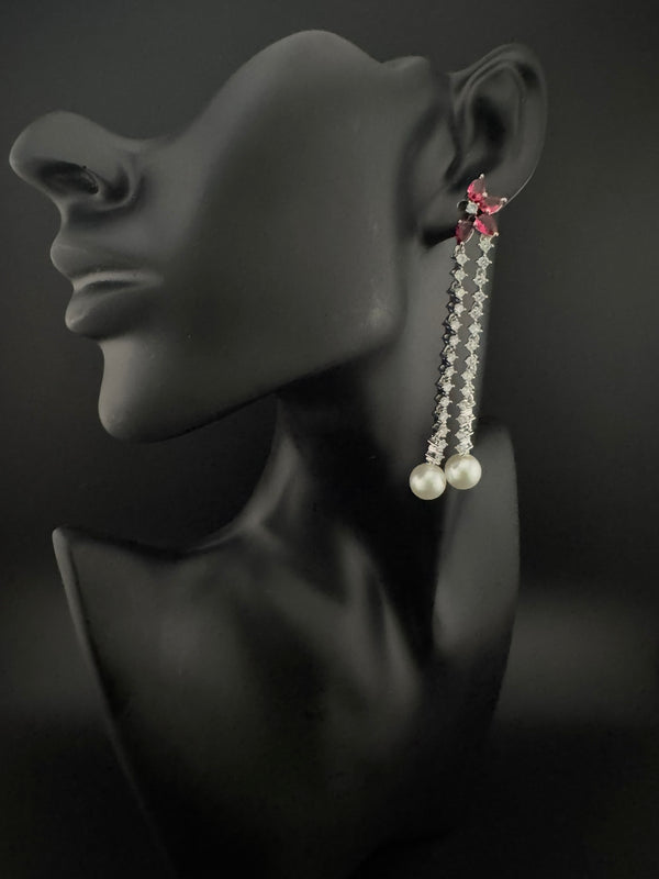 Premium silver color Cubic Zirconia Dangle long earrings with Crystal and Pearls is designer Statement long earrings