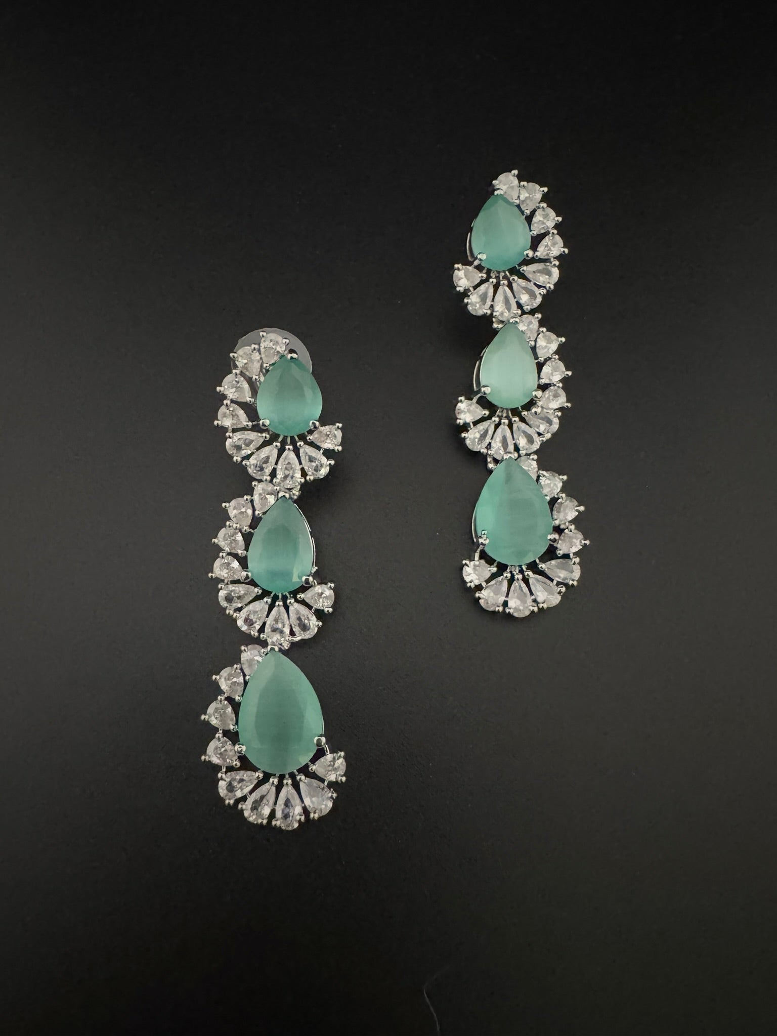 Premium Cubic Zirconia and Crystal stone in silver color Statement Long earrings