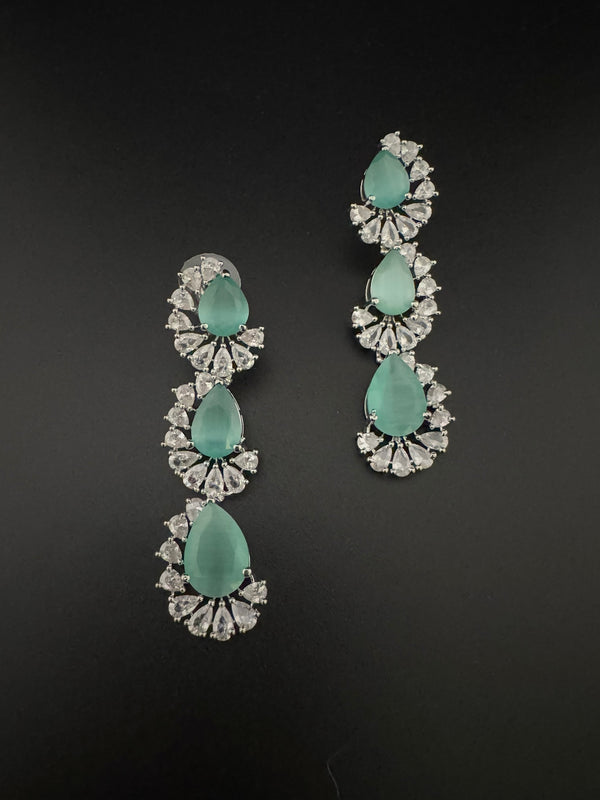 Premium Cubic Zirconia and Crystal stone in silver color Statement Long earrings