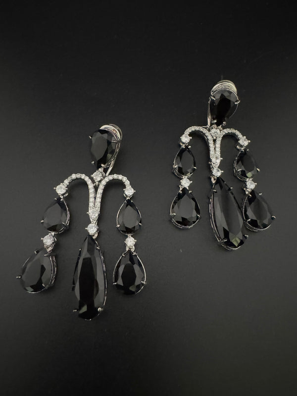Premium Cubic Zirconia and glass stone in silver color is designer Inspired Statement Long earrings