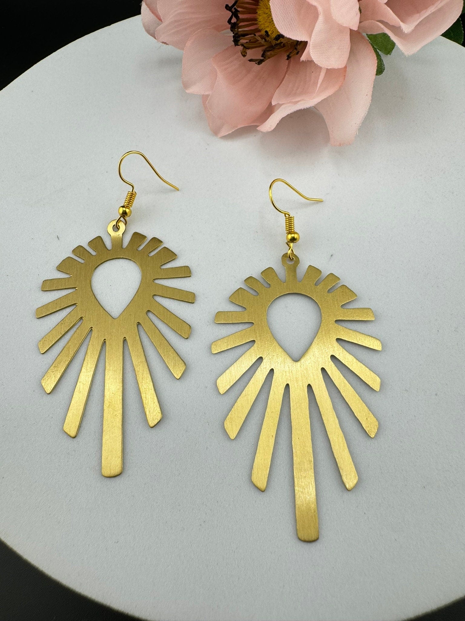 Matt Gold quirky earrings in unique sleek dazzle design