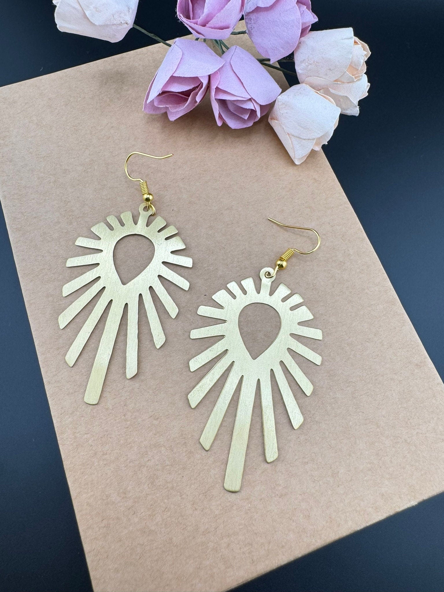 Matt Gold quirky earrings in unique sleek dazzle design