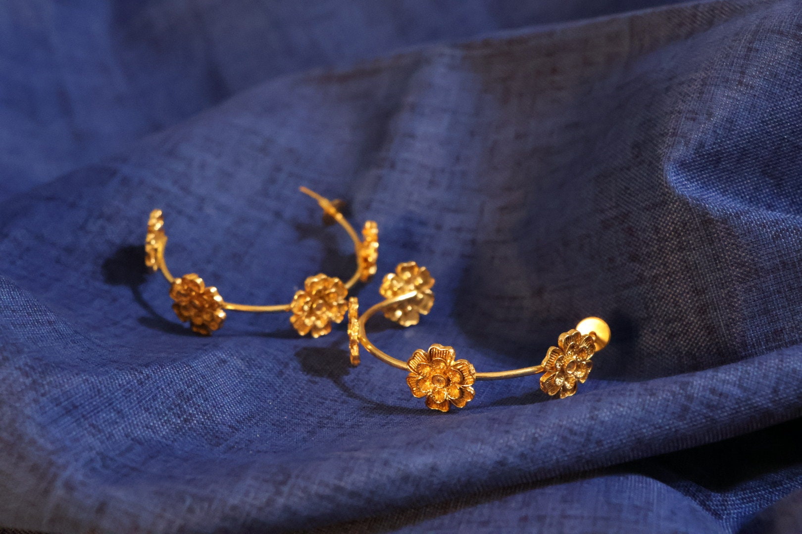 Matt Gold Statement Hoop earrings in unique Flowers design around hoop