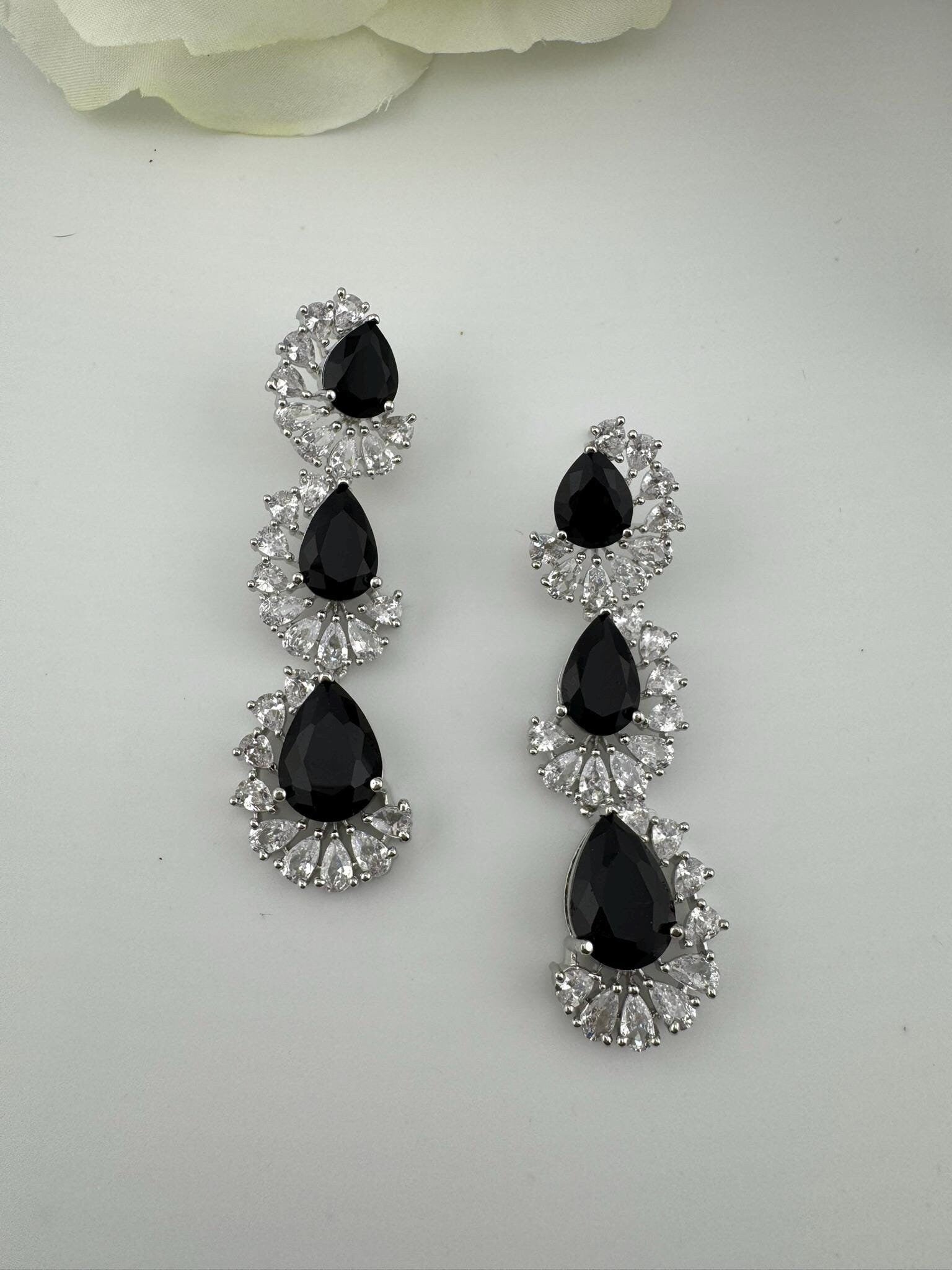 Premium Cubic Zirconia and Crystal stone in silver color Statement Long earrings