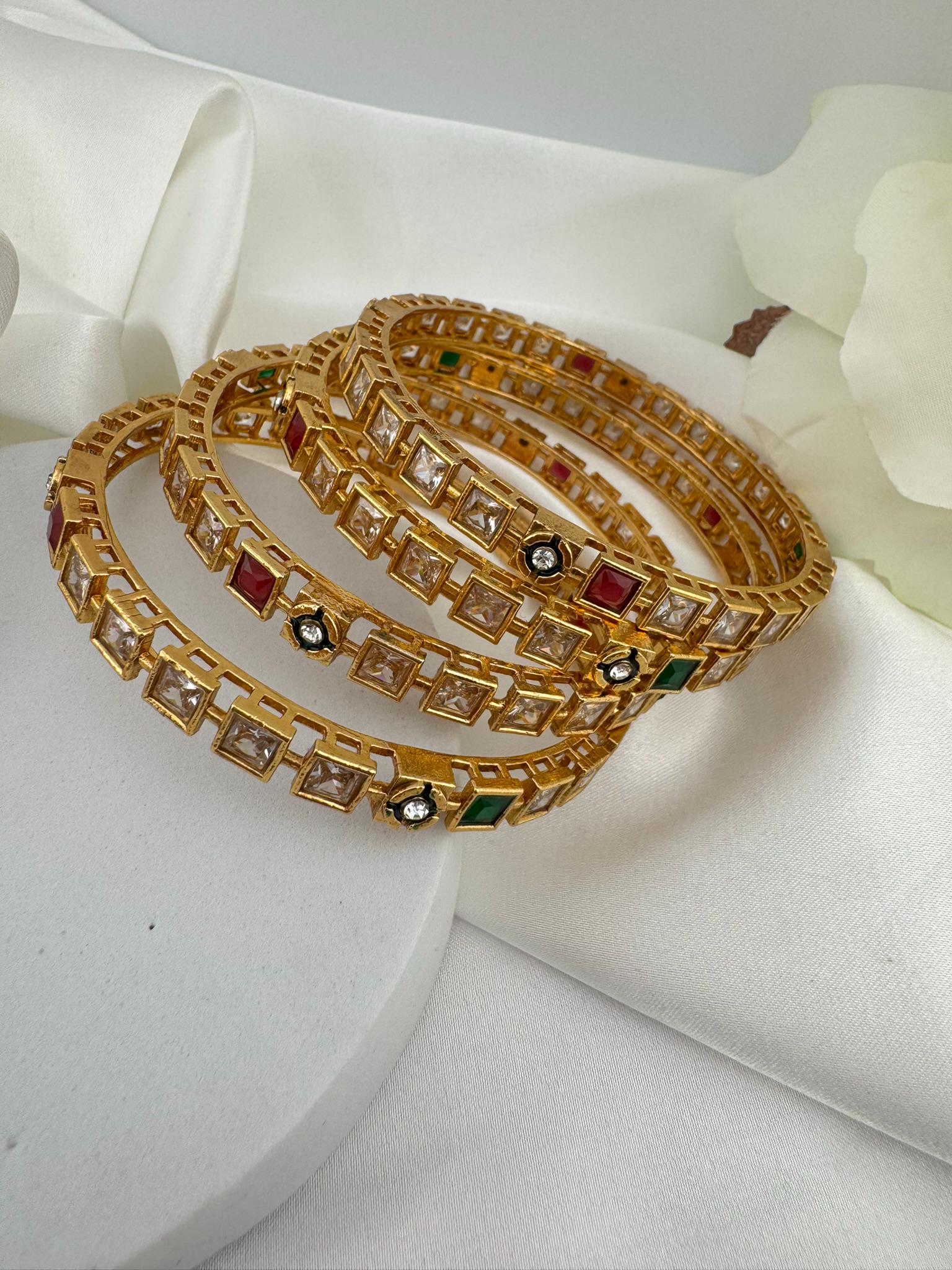 Set of 4 Matt Gold and multicolor stones in Amrapali inspired bangles set