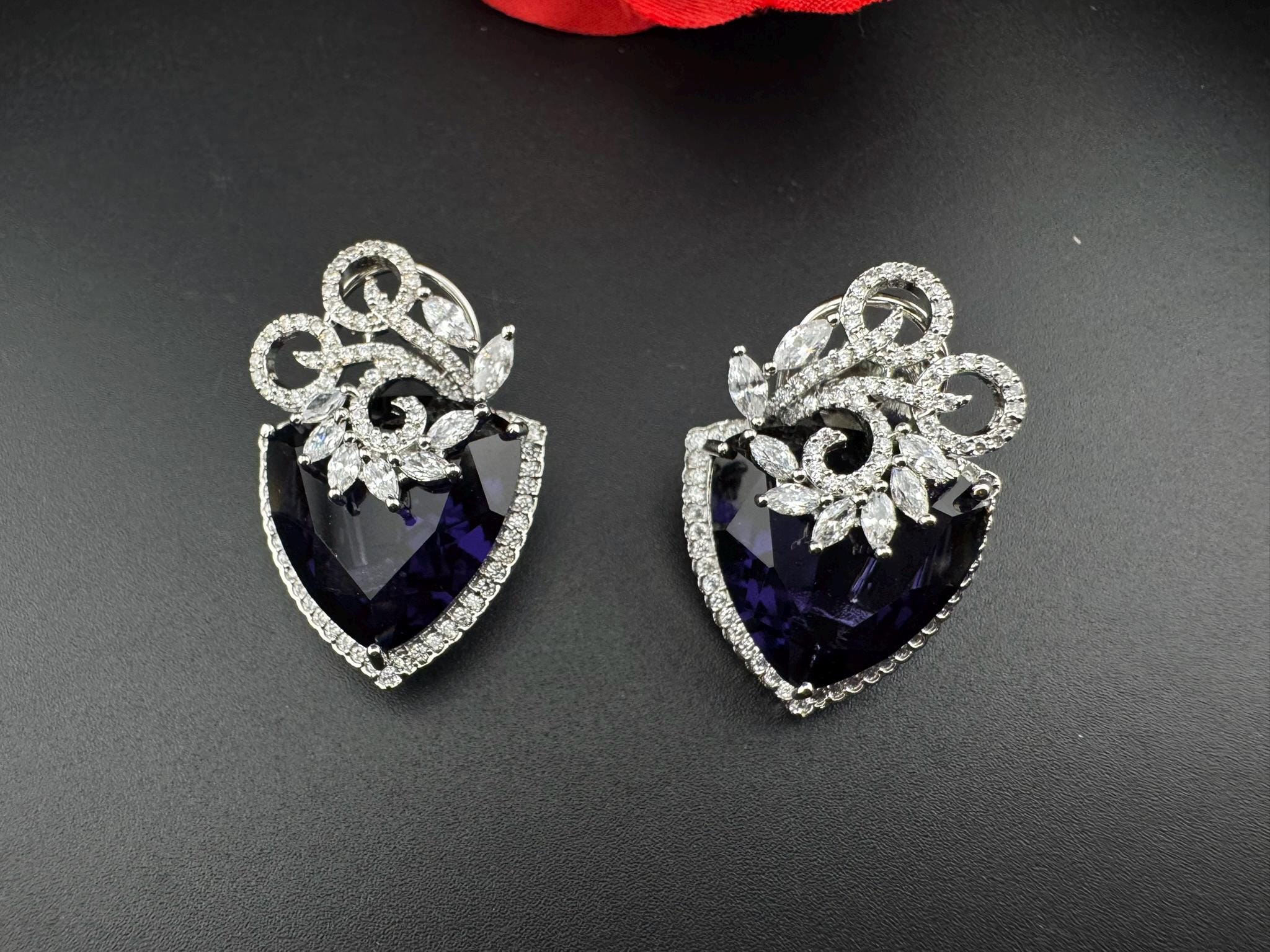 Premium Cubic Zirconia and Crystal stone in silver Polish Statement Studs earrings