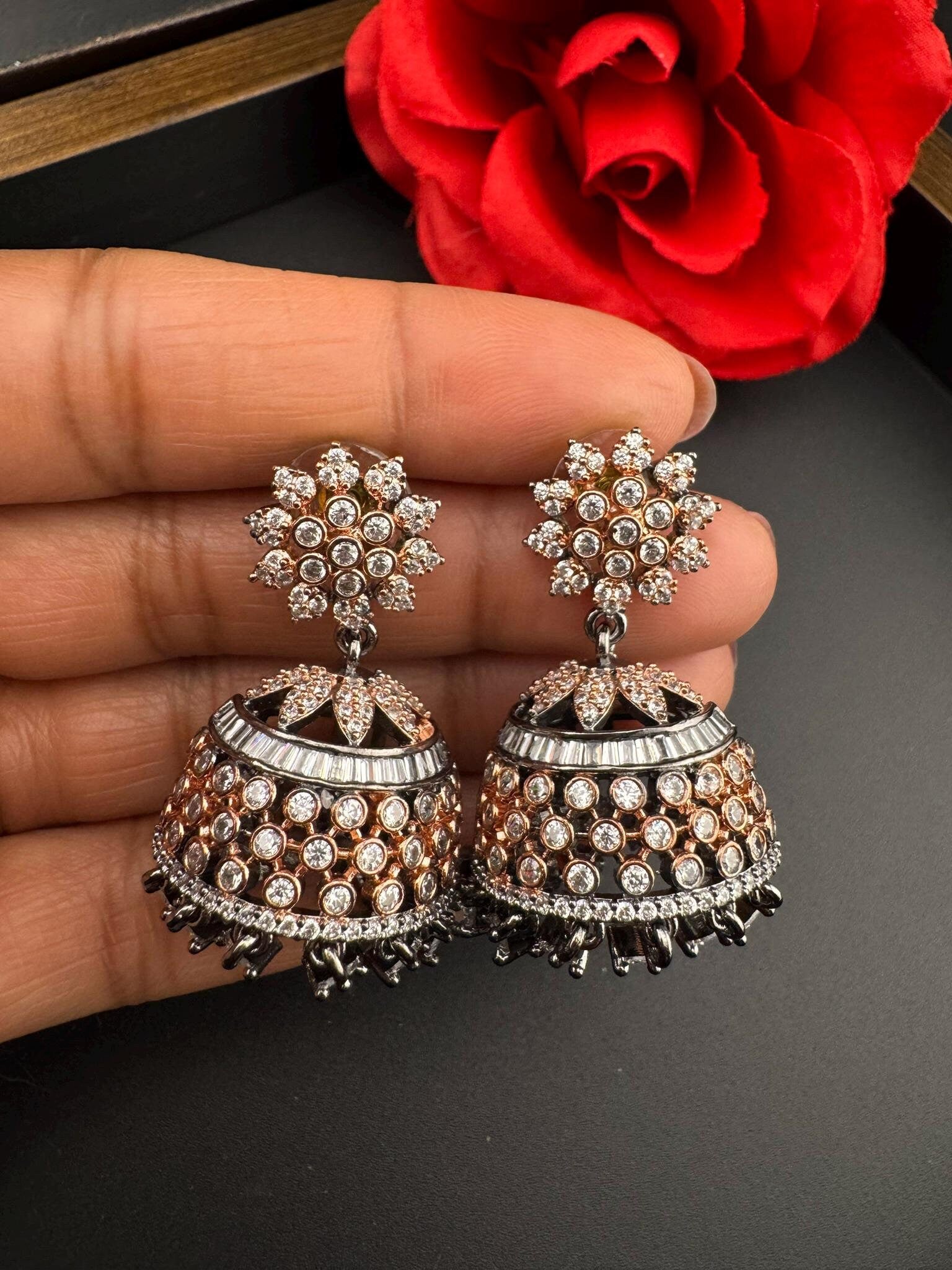 Premium Victorian Polish and  Rose Gold color Jhumka with Cubic Zirconia in unique setting