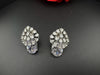 Premium Studs in Cubic Zirconia and Glass stone in silver color is designer Inspired Statement earrings