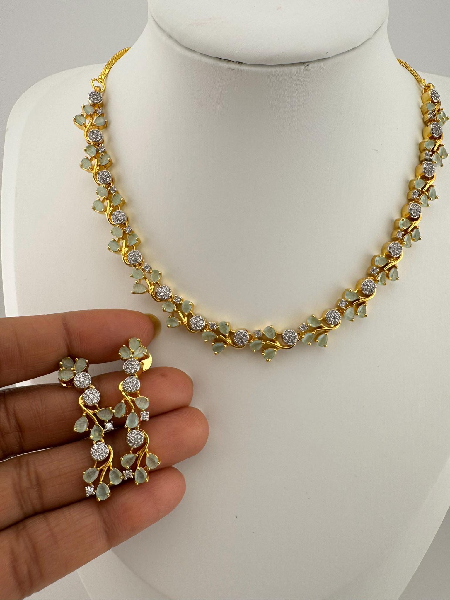 Premium American Diamond, Cubic Zirconia, Stones, Gold Polish, Flower Necklace set with earrings