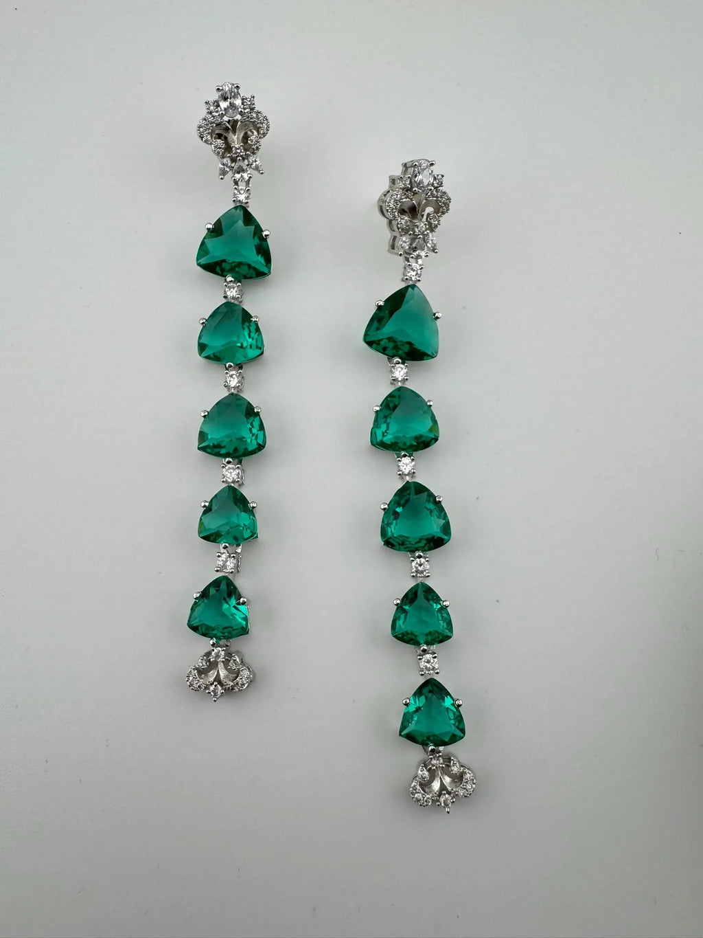 Premium Cubic Zirconia and glass stone in silver color is designer Inspired Statement Long earrings