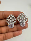 Premium Studs in Cubic Zirconia and Glass stone in silver color is designer Inspired Statement earrings