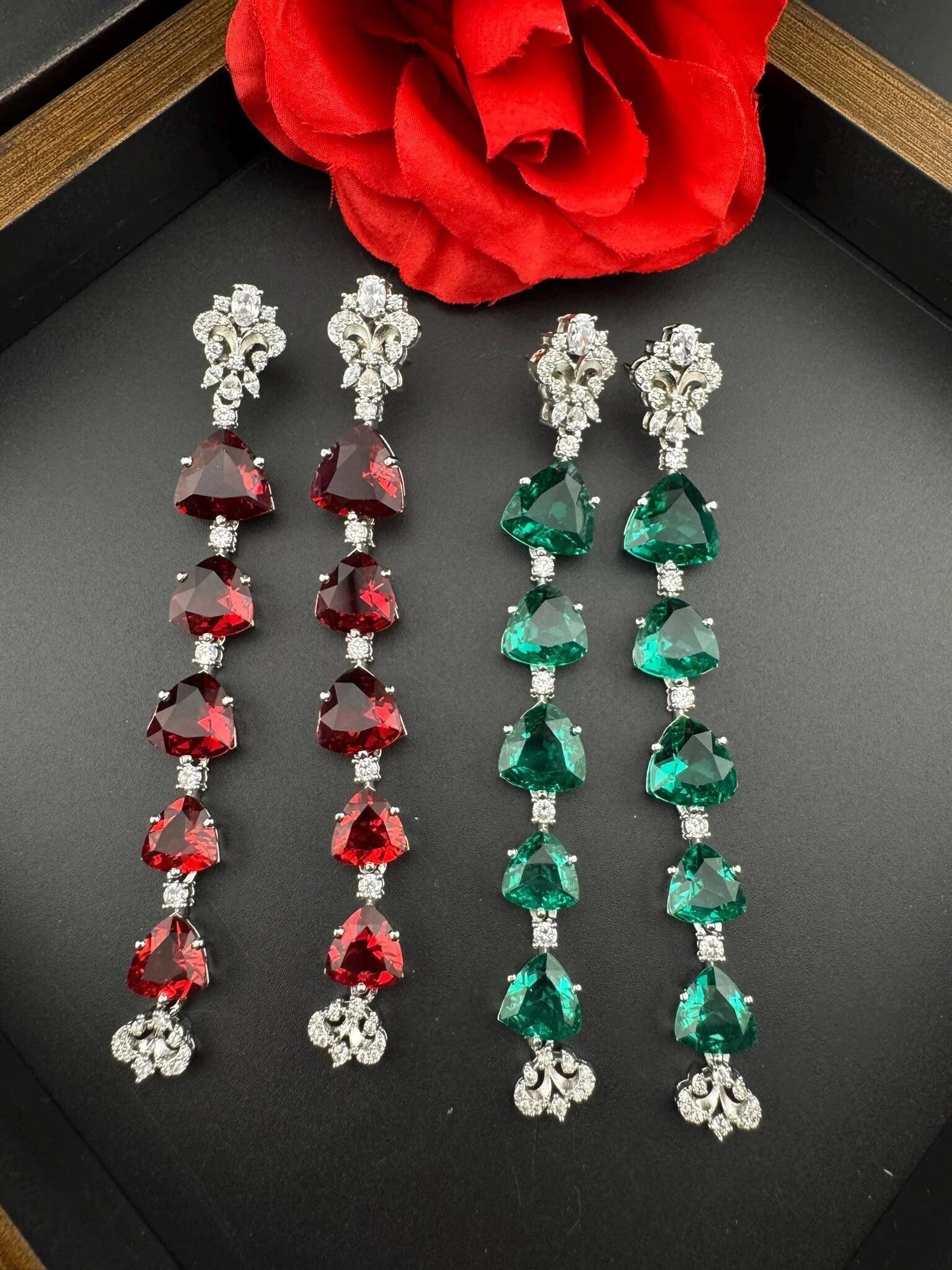 Premium Cubic Zirconia and glass stone in silver color is designer Inspired Statement Long earrings