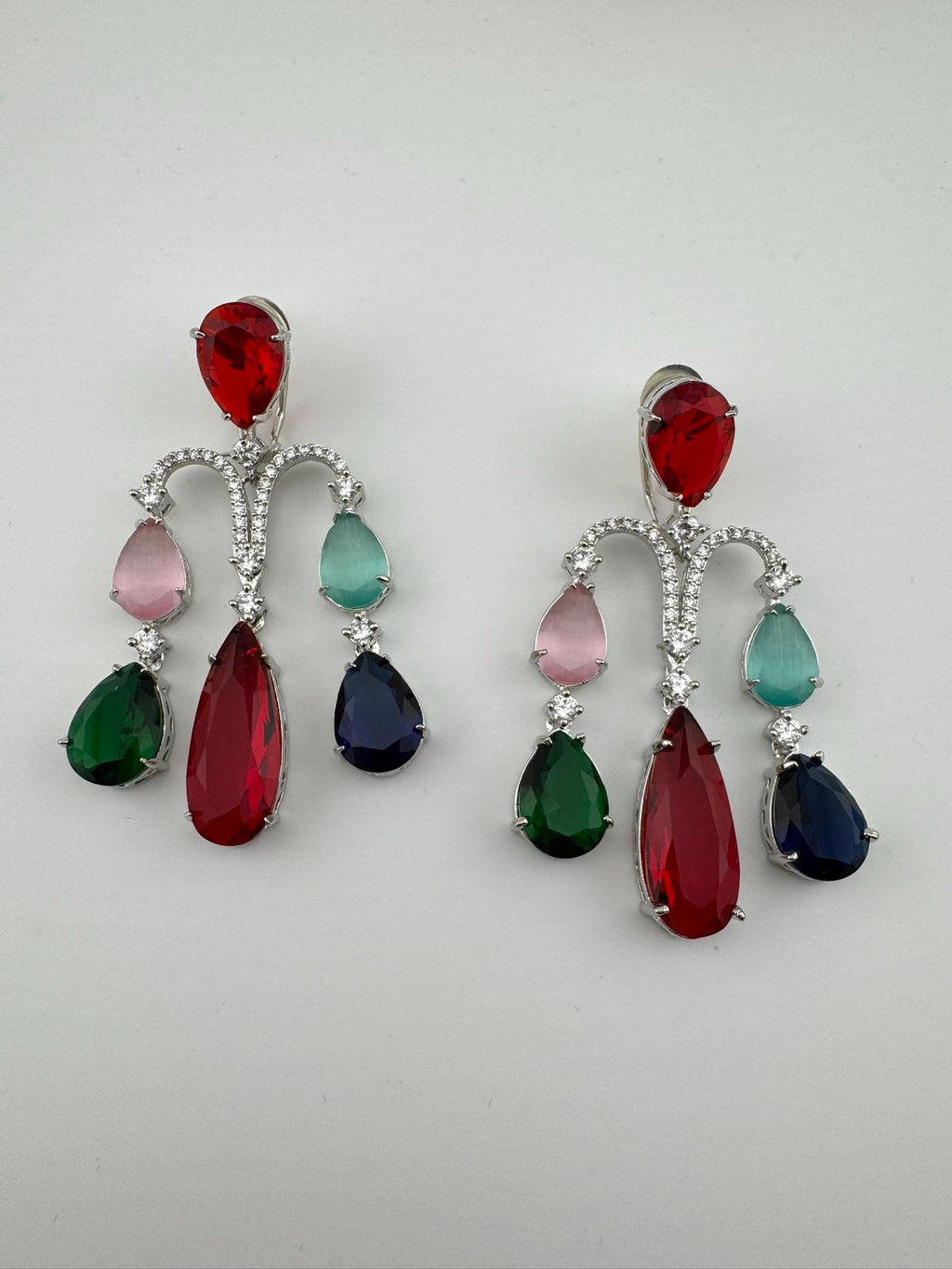 Premium Cubic Zirconia and glass stone in silver color is designer Inspired Statement Long earrings