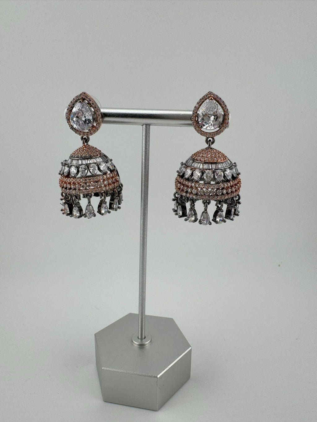 Premium Victorian Polish and  Rose Gold color Jhumka with Cubic Zirconia in unique setting