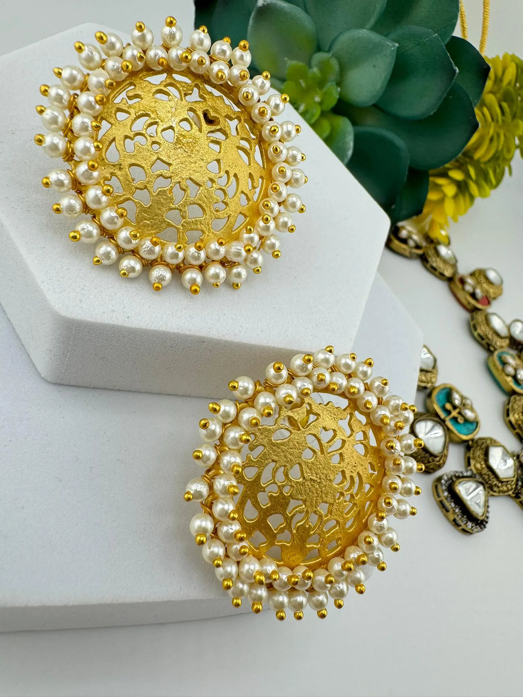 Premium Gold detailing and Pearls designer stud earring