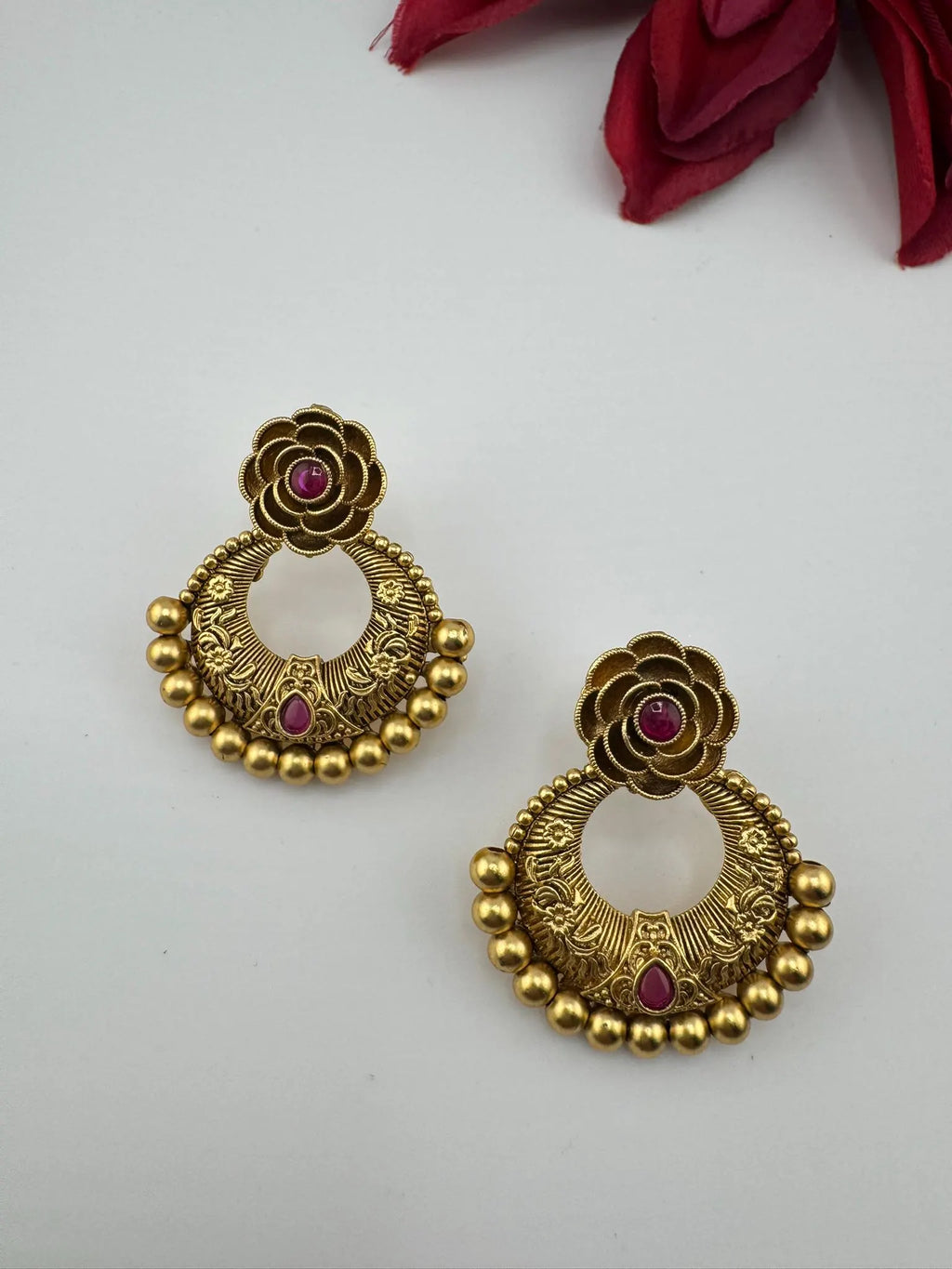 Premium Ruby and Pachi kundan Chand Bali in Matt Gold and Pearls is Amrapali inspired designer earrings