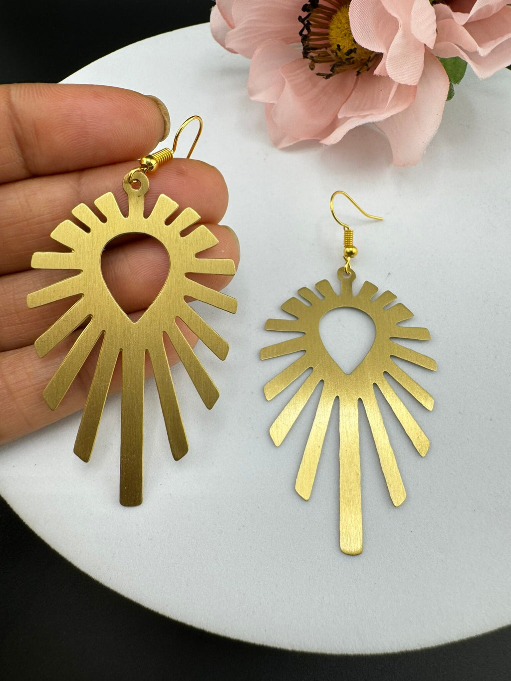 Matt Gold quirky earrings in unique sleek dazzle design
