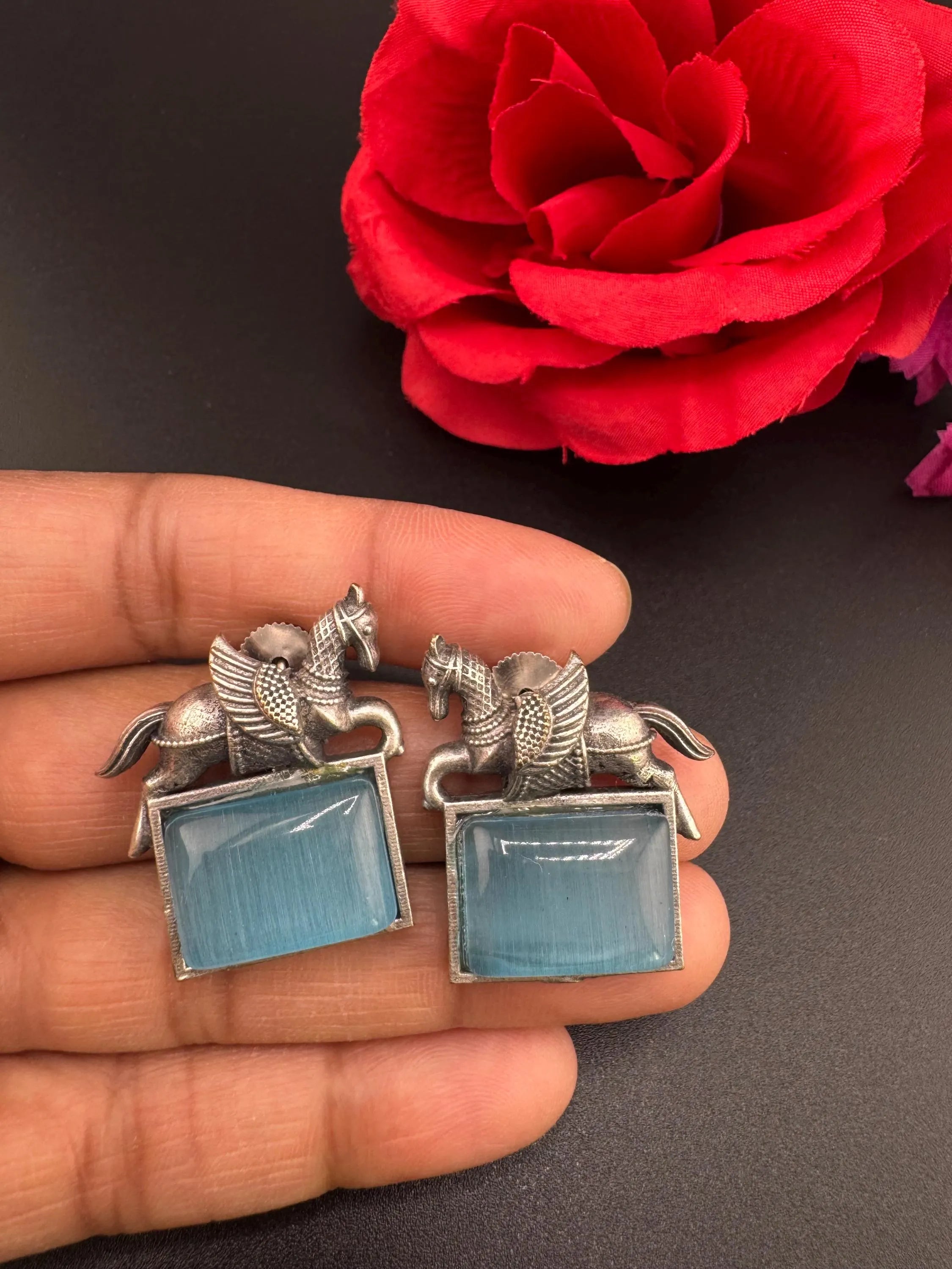 Oxidized German silver studs earrings with Horse details