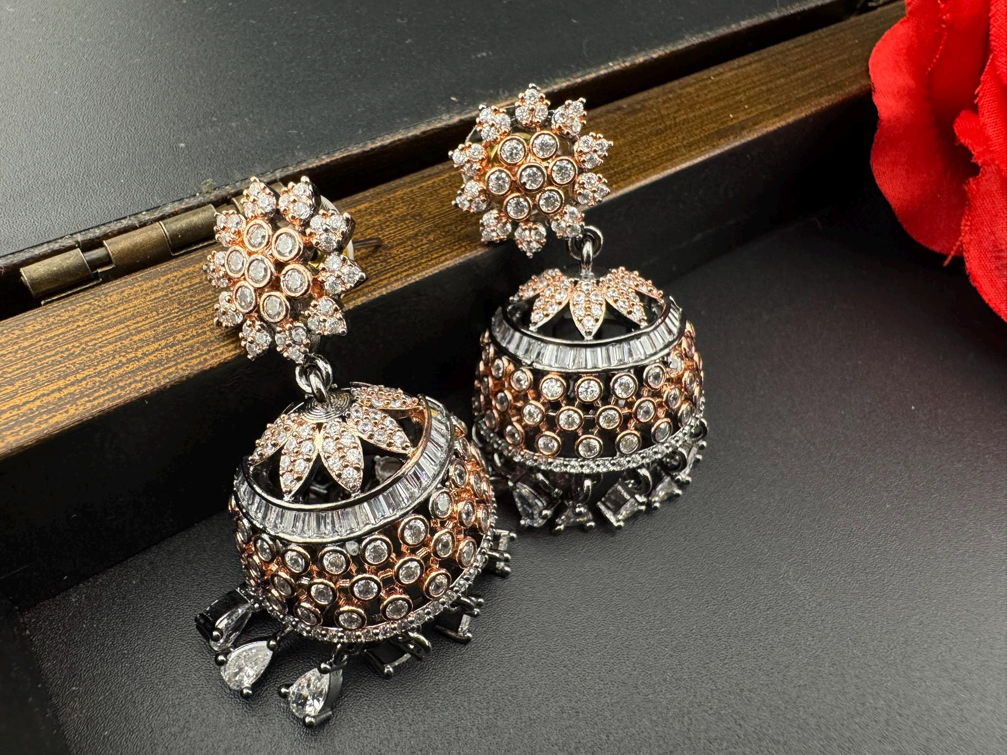 Premium Victorian Polish and  Rose Gold color Jhumka with Cubic Zirconia in unique setting