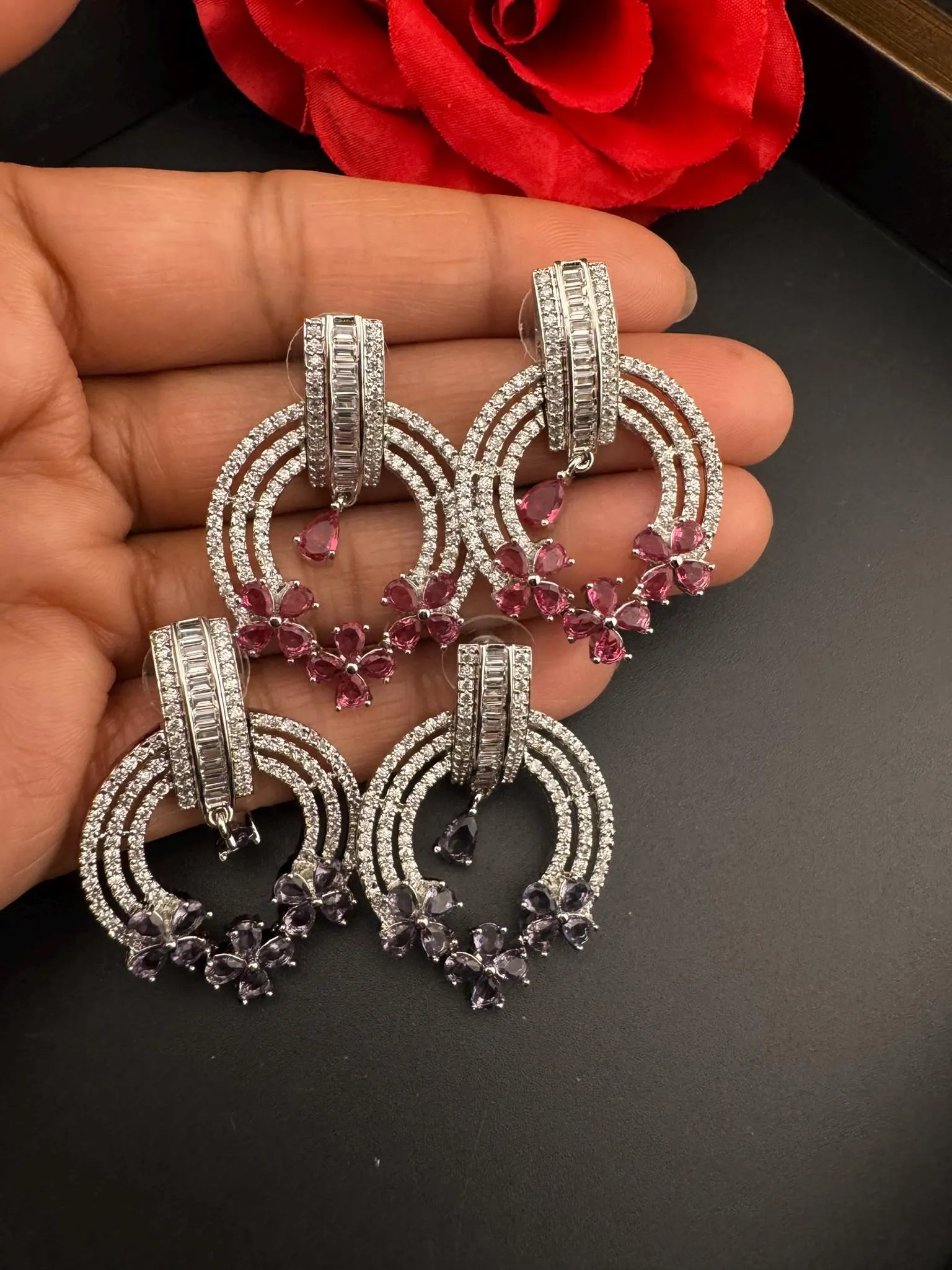 Premium earrings in Cubic Zirconia and Glass stone in silver color is designer Inspired Statement earrings