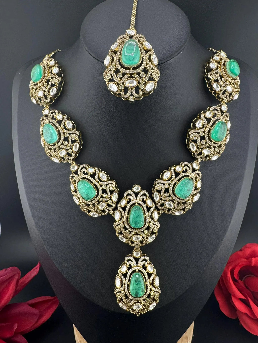 Premium Quality in Moissanite, uncut Kundan, CZ, Doublet stones in matt gold is Designer inspired fusion Necklace with Stud earring & Tikka