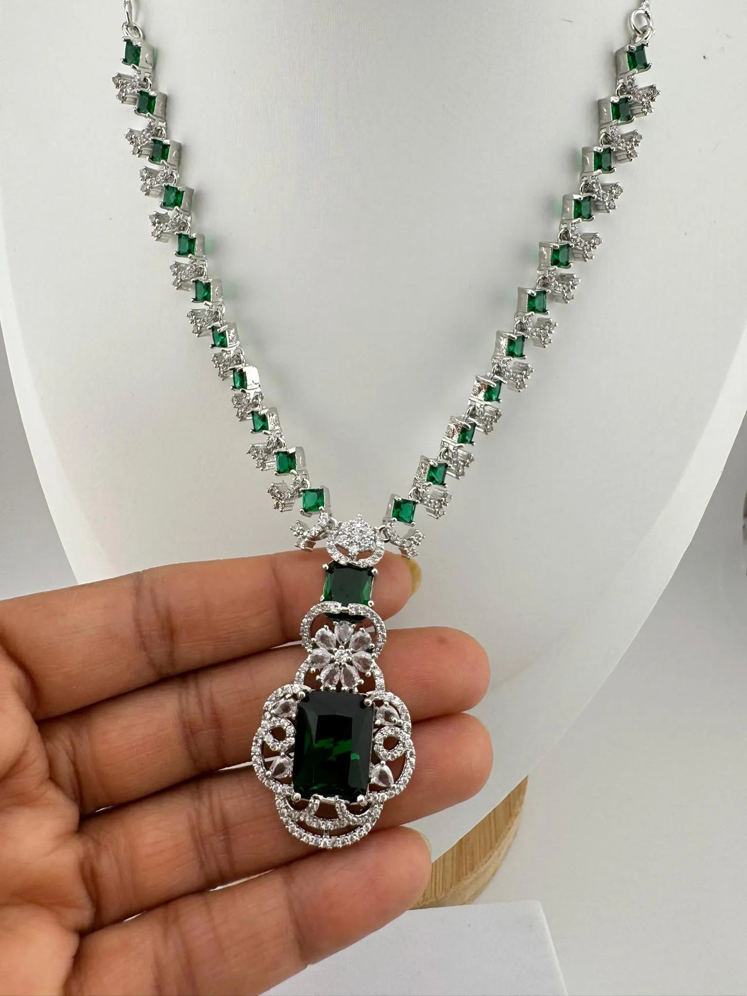 Premium American Diamond, Cubic Zirconia, Silver Polish Green Neeta Ambani Necklace set with studs earring