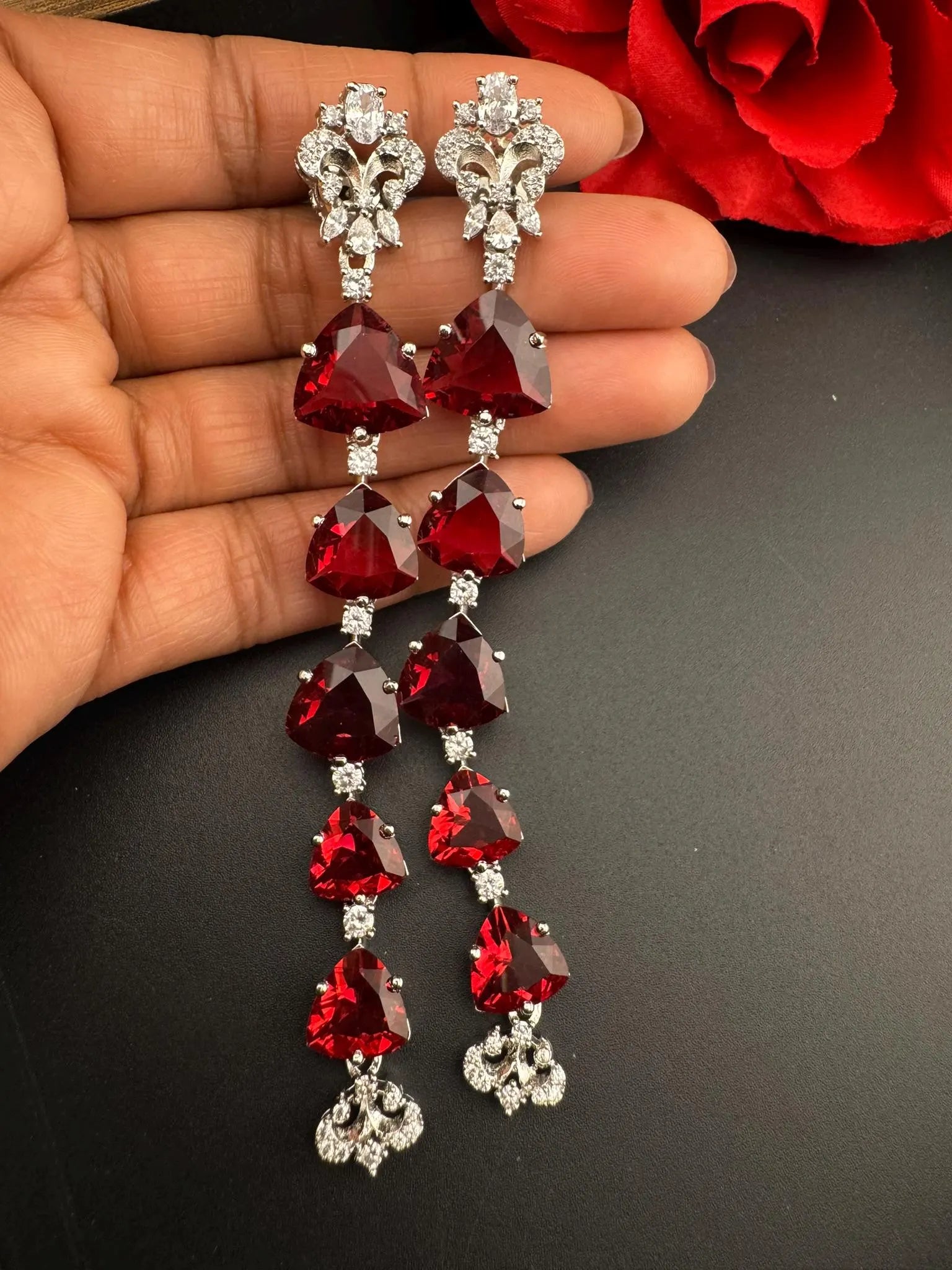 Premium Cubic Zirconia and glass stone in silver color is designer Inspired Statement Long earrings