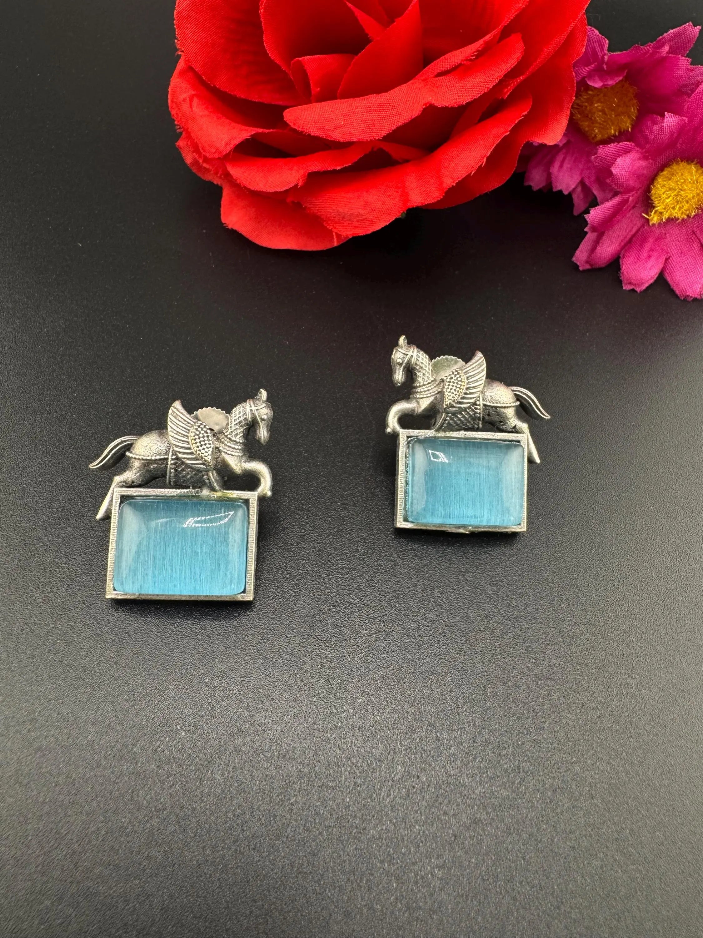 Oxidized German silver studs earrings with Horse details