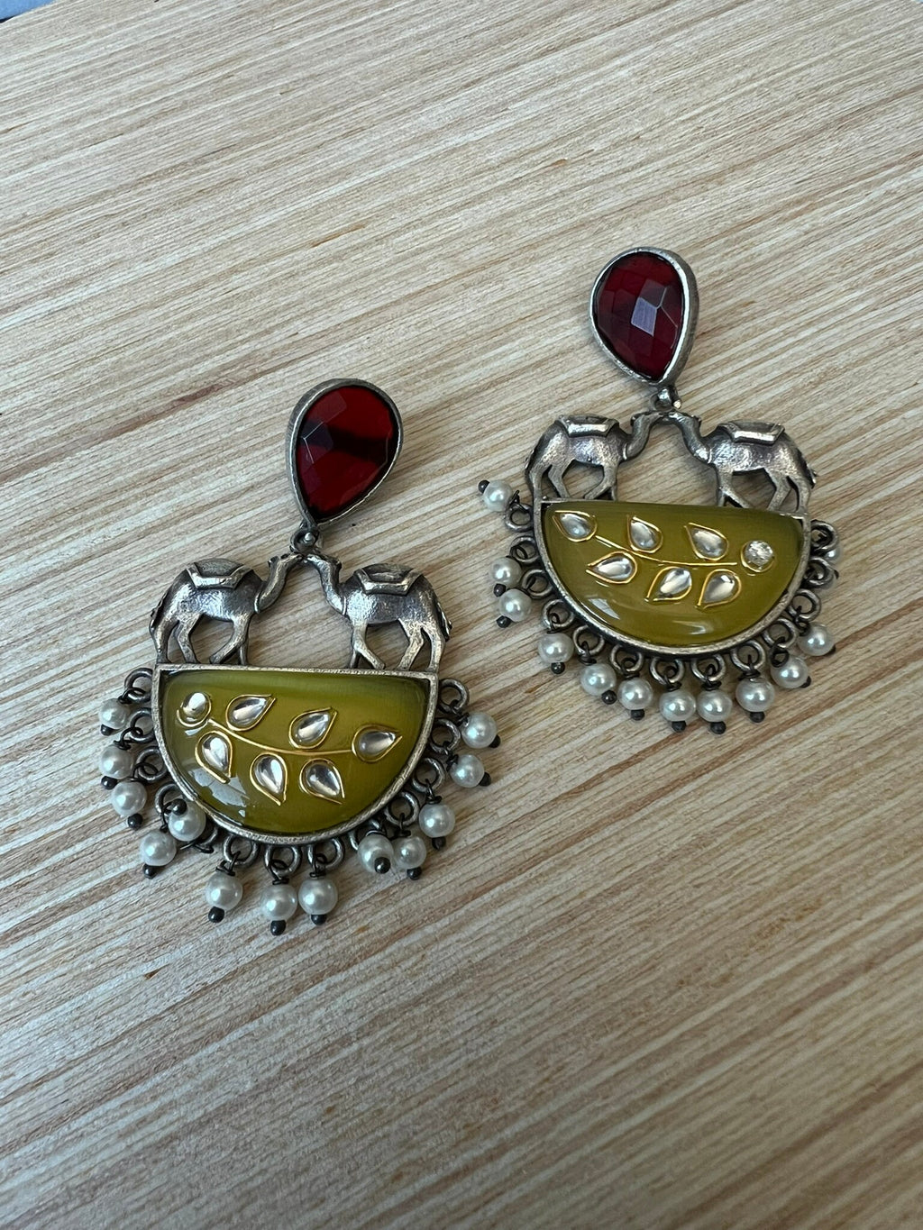 Yellow oxidized silver earring with Camels, stones and pearls