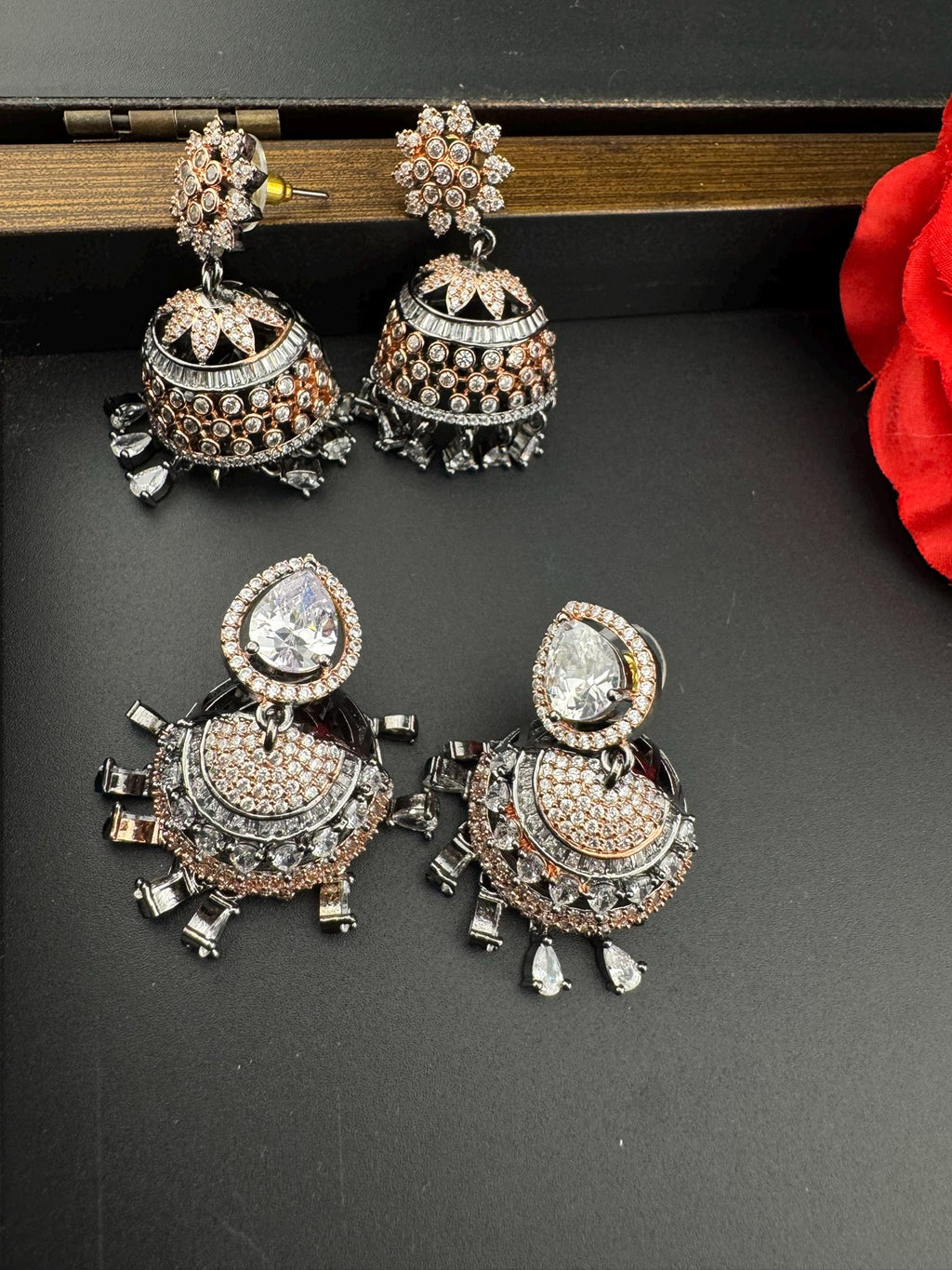 Premium Victorian Polish and  Rose Gold color Jhumka with Cubic Zirconia in unique setting