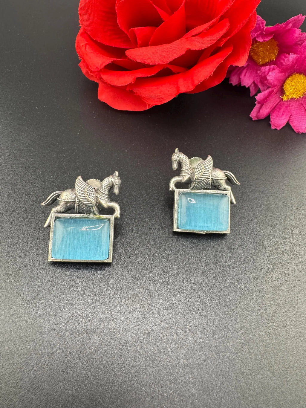 Oxidized German silver studs earrings with Horse details