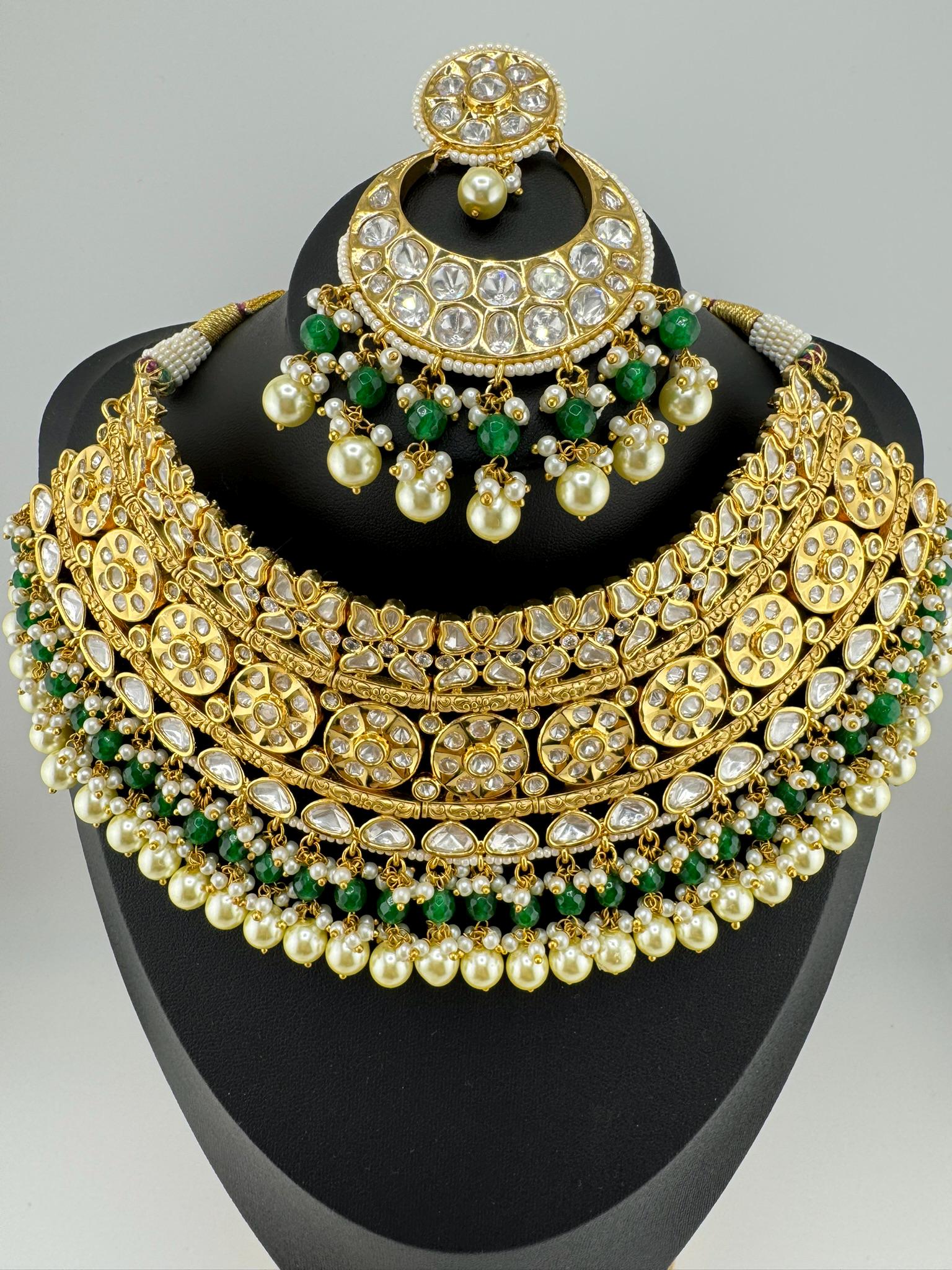 BRIDAL Tyaani Kundan Inspired Premium High gloss Broad Bridal necklace set with earring and Tika