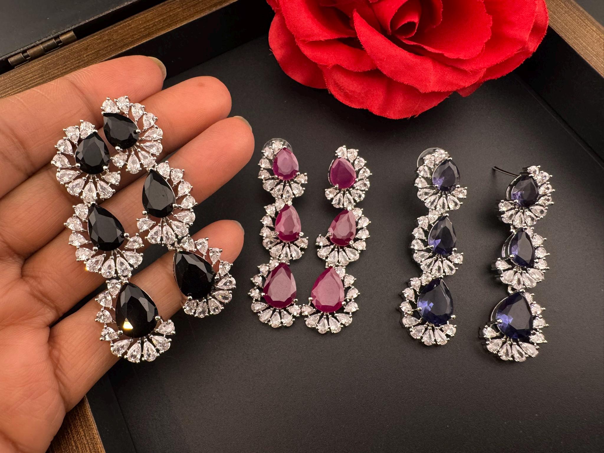 Premium Cubic Zirconia and Crystal stone in silver color Statement Long earrings