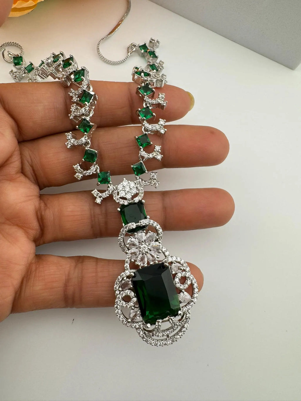 Premium American Diamond, Cubic Zirconia, Silver Polish Green Neeta Ambani Necklace set with studs earring