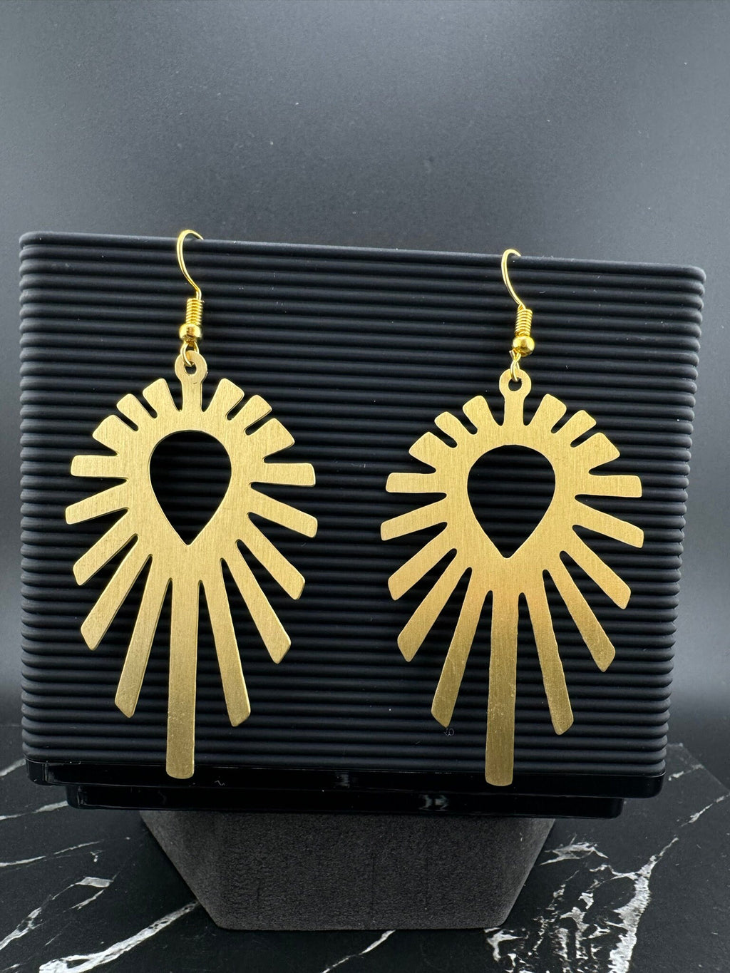 Matt Gold quirky earrings in unique sleek dazzle design