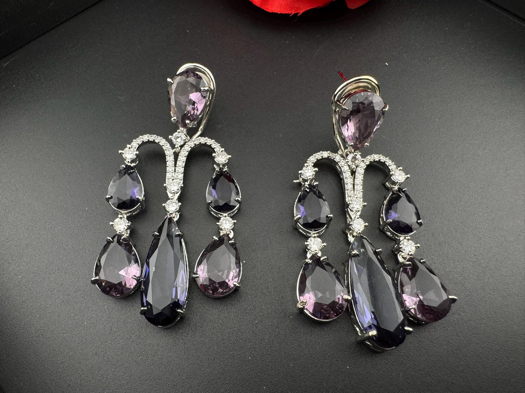 Premium Cubic Zirconia and glass stone in silver color is designer Inspired Statement Long earrings