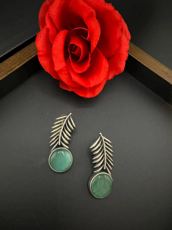 Oxidized German silver leaf pattern Stud earrings with Monalisa stone