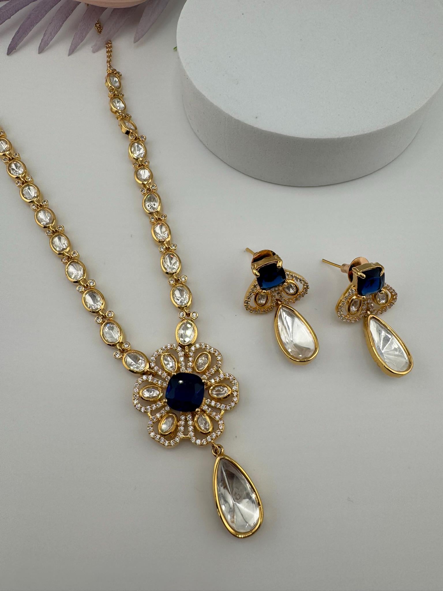 Premium Quality Moissanite Kundan, CZ,blue stone is Tyaani inspired Designer Necklace set with Kundan earrings
