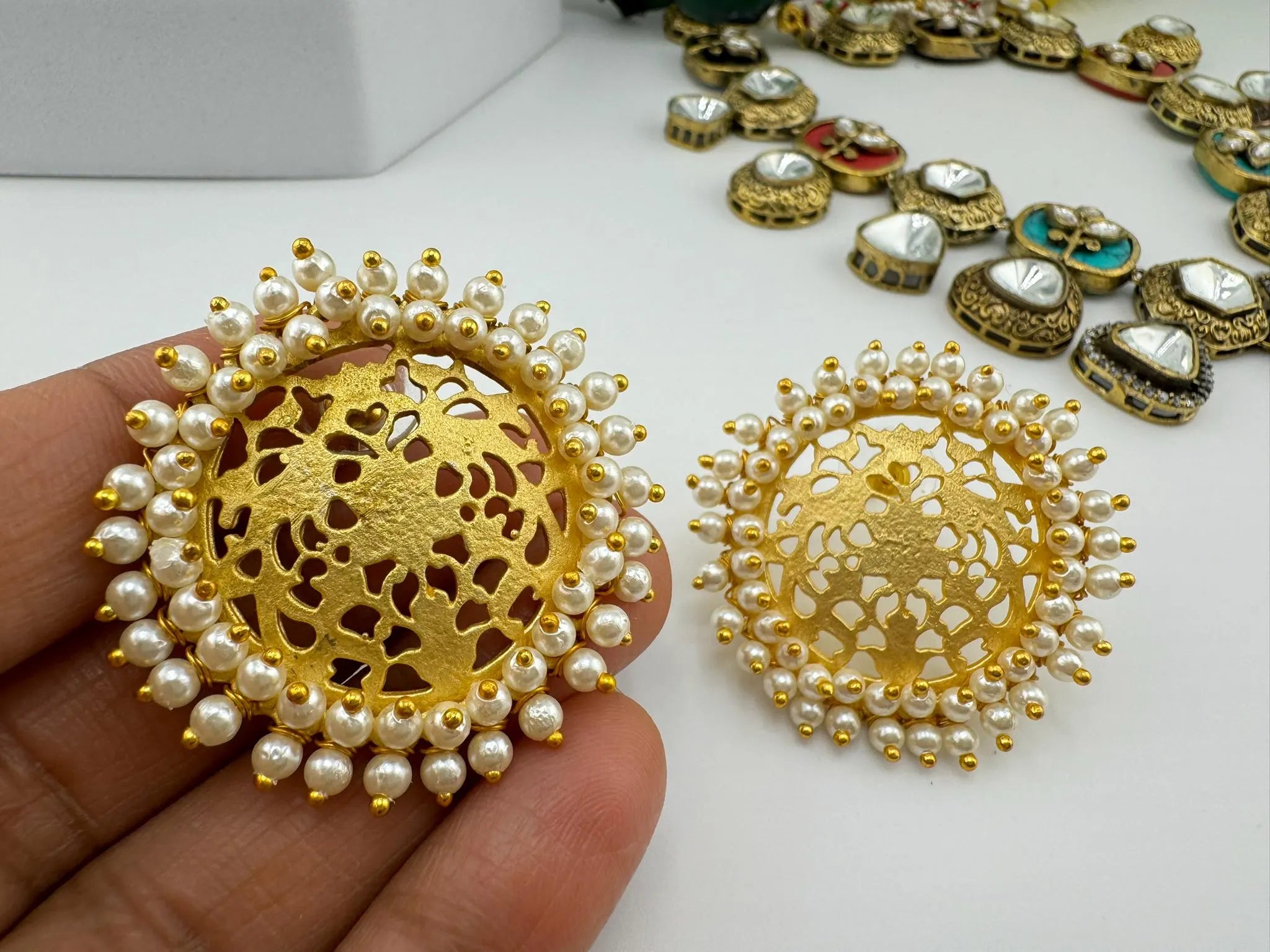 Premium Gold detailing and Pearls designer stud earring